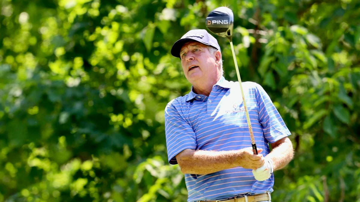 Jay Haas Holding Golf Club Up Wallpaper