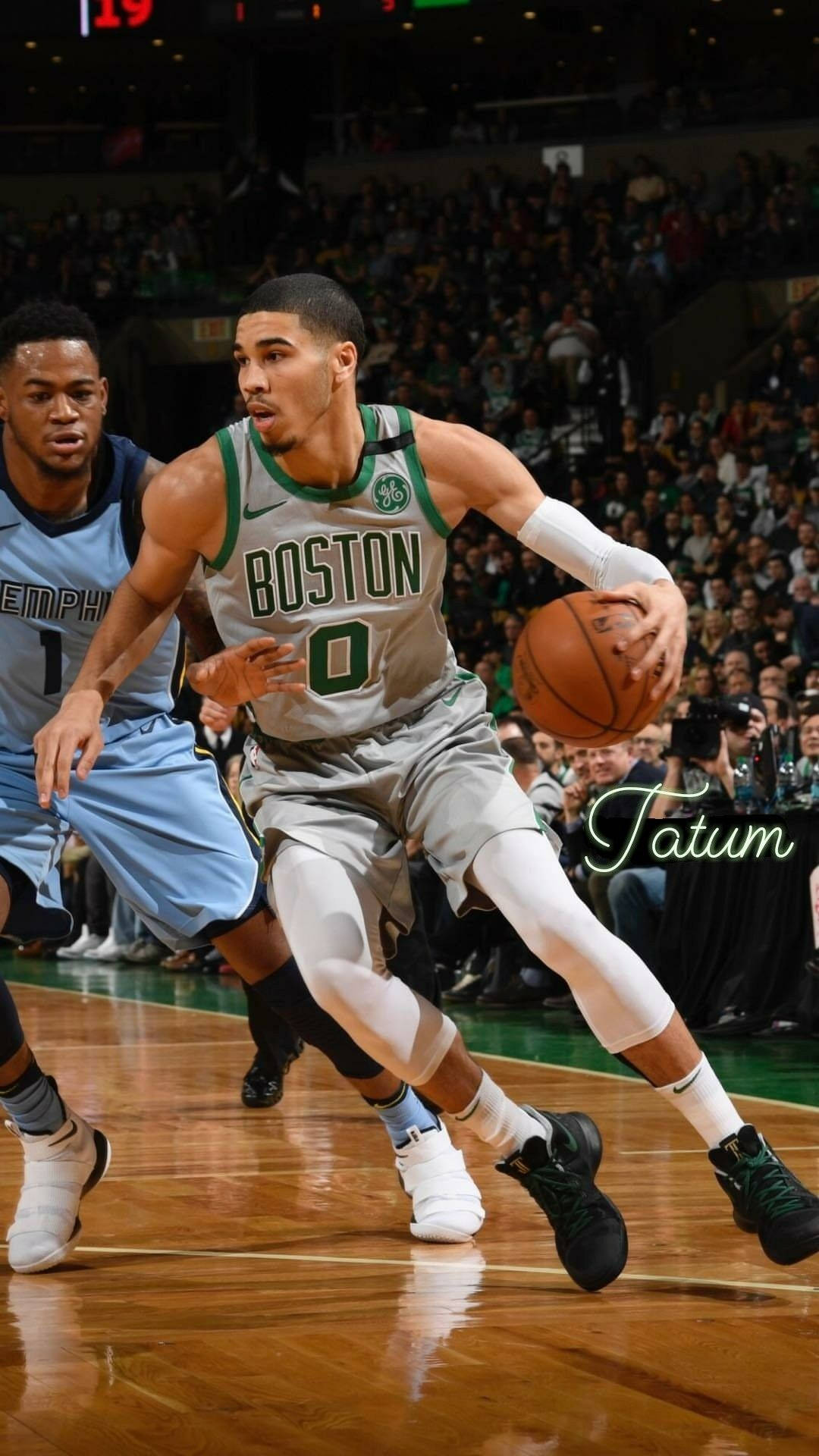 Jayson Tatum In Action: An Epitome Of Athletic Excellence Wallpaper