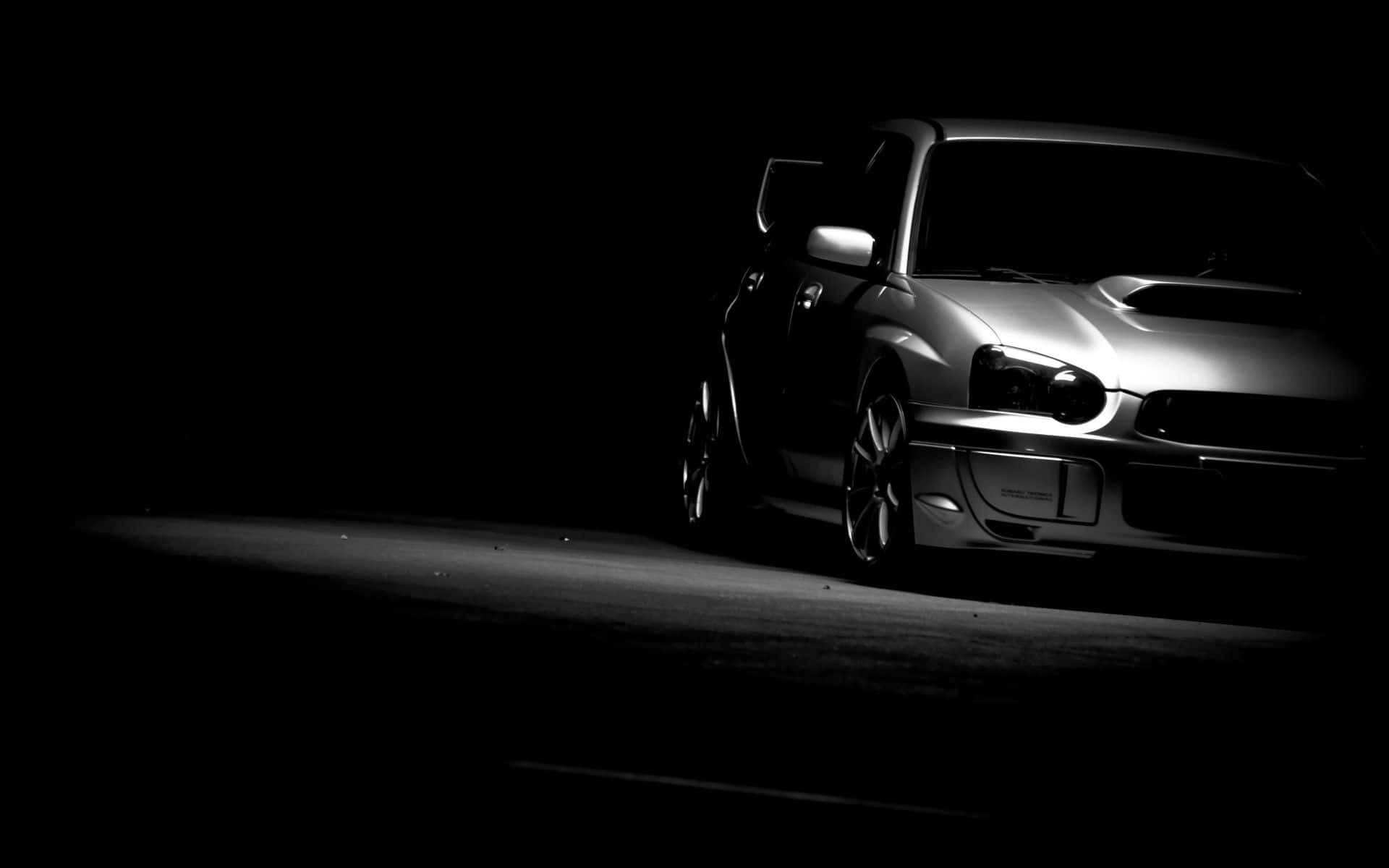 A Black And White Image Of A Subaru