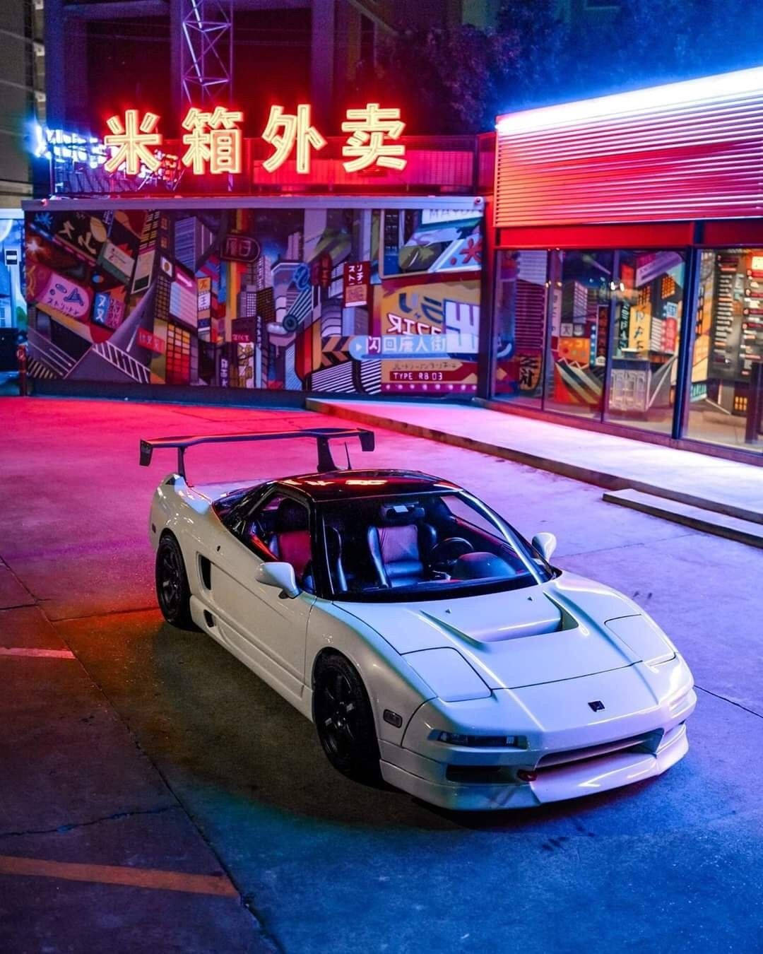 Jdm Car Surrounded By Neon Lights Wallpaper