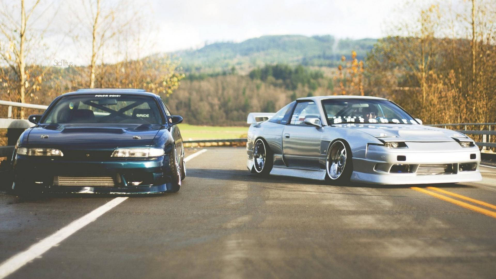 Jdm Cars Parked On Road Wallpaper