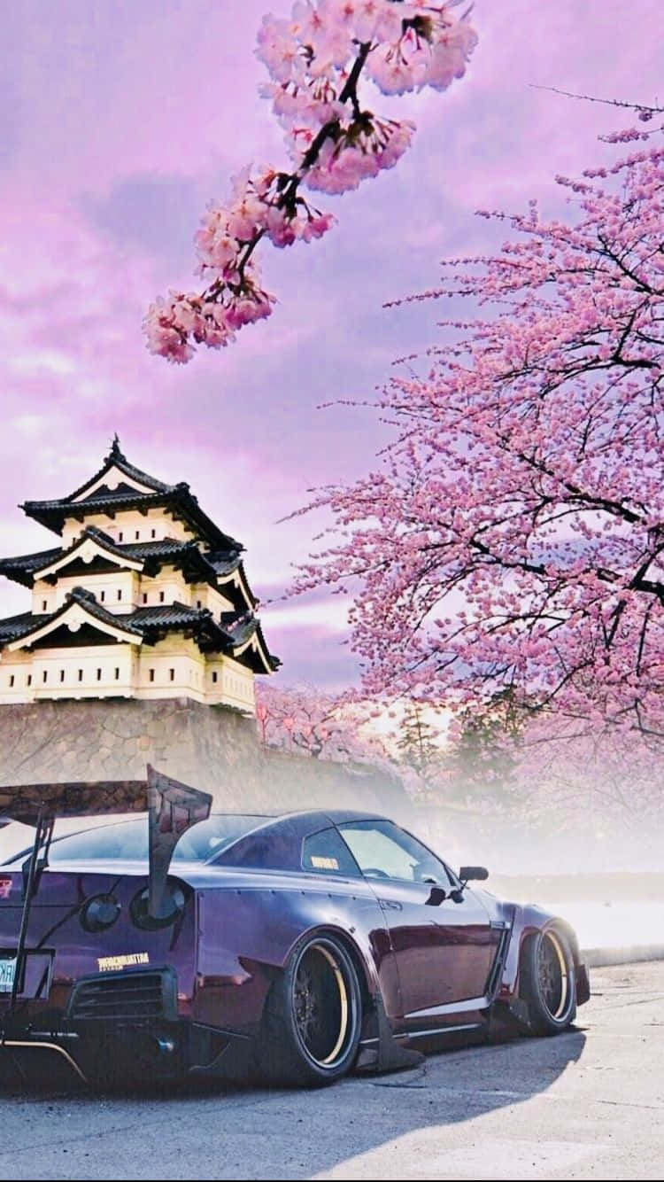 A Purple Sports Car Parked In Front Of A Castle
