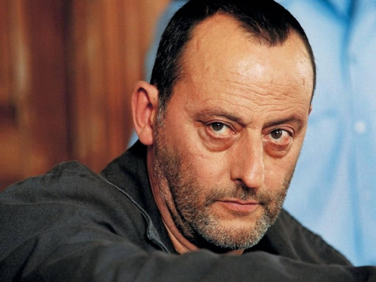 French actor Jean Reno in a scene from 'The Corsican File' movie. Wallpaper