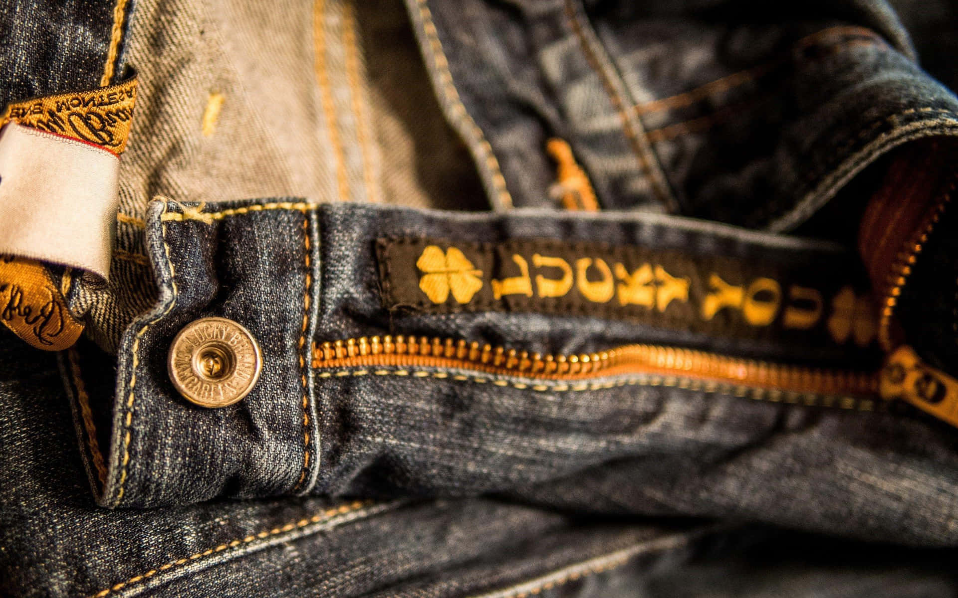 A Close Up Of A Pair Of Jeans With A Zipper