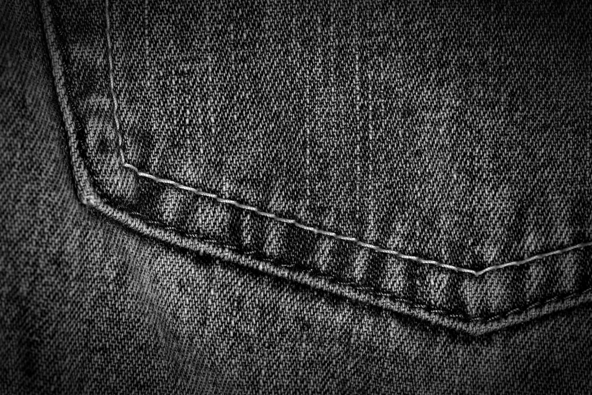 Ettæt Billede Af En Lomme På Et Par Jeans.