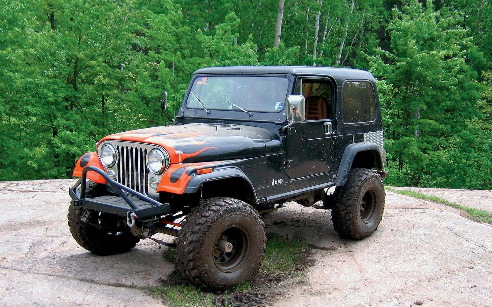 Vintage Jeep CJ - Conquer the Off-Road in Classic Style Wallpaper