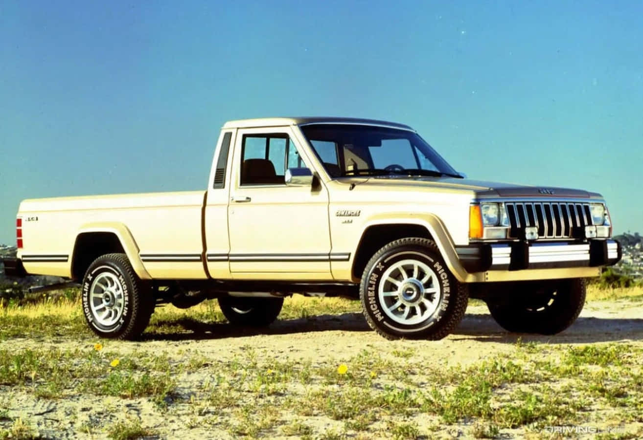 Jeep Comanche conquering an off-road adventure Wallpaper