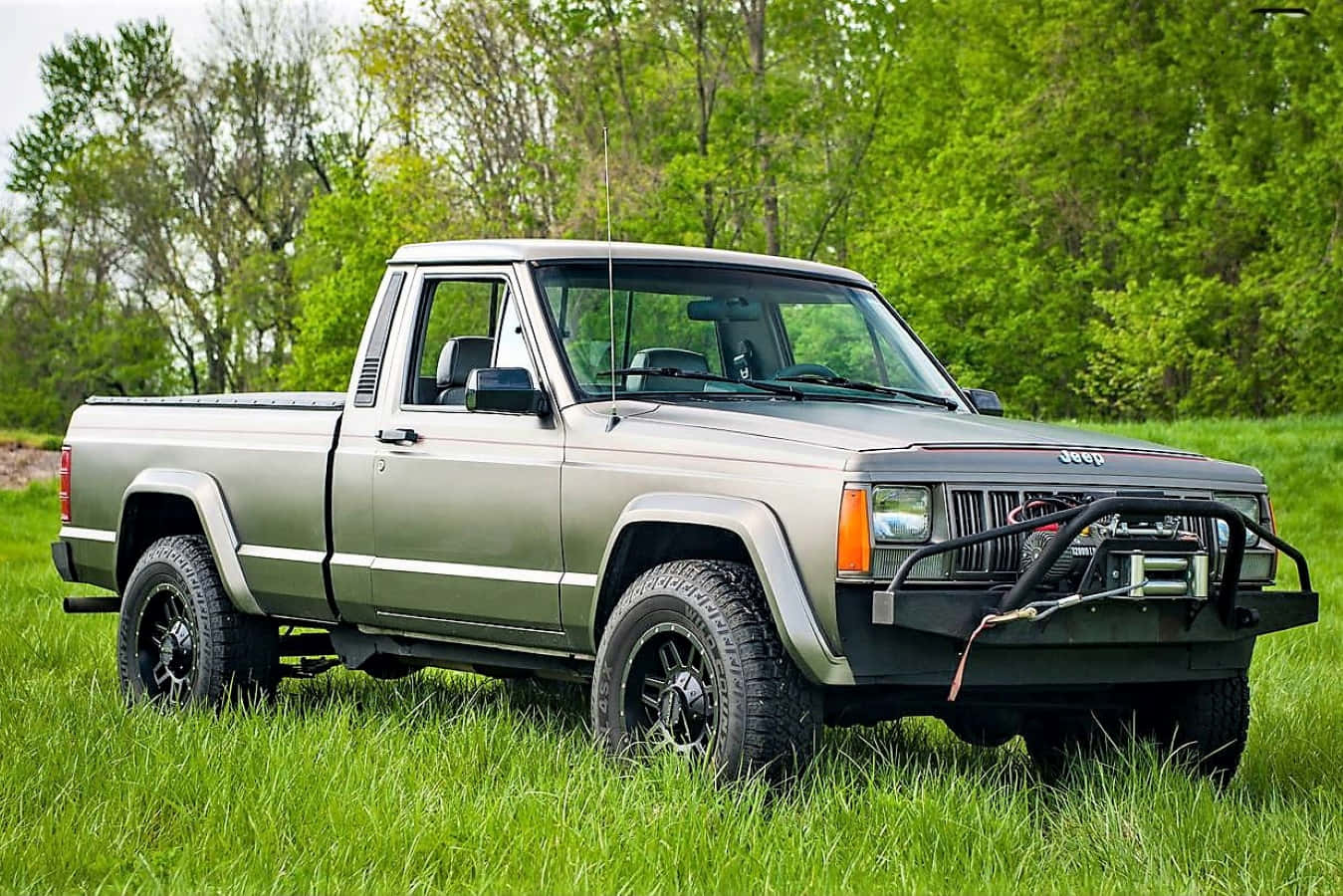 Caption: Jeep Comanche in the Wilderness Wallpaper