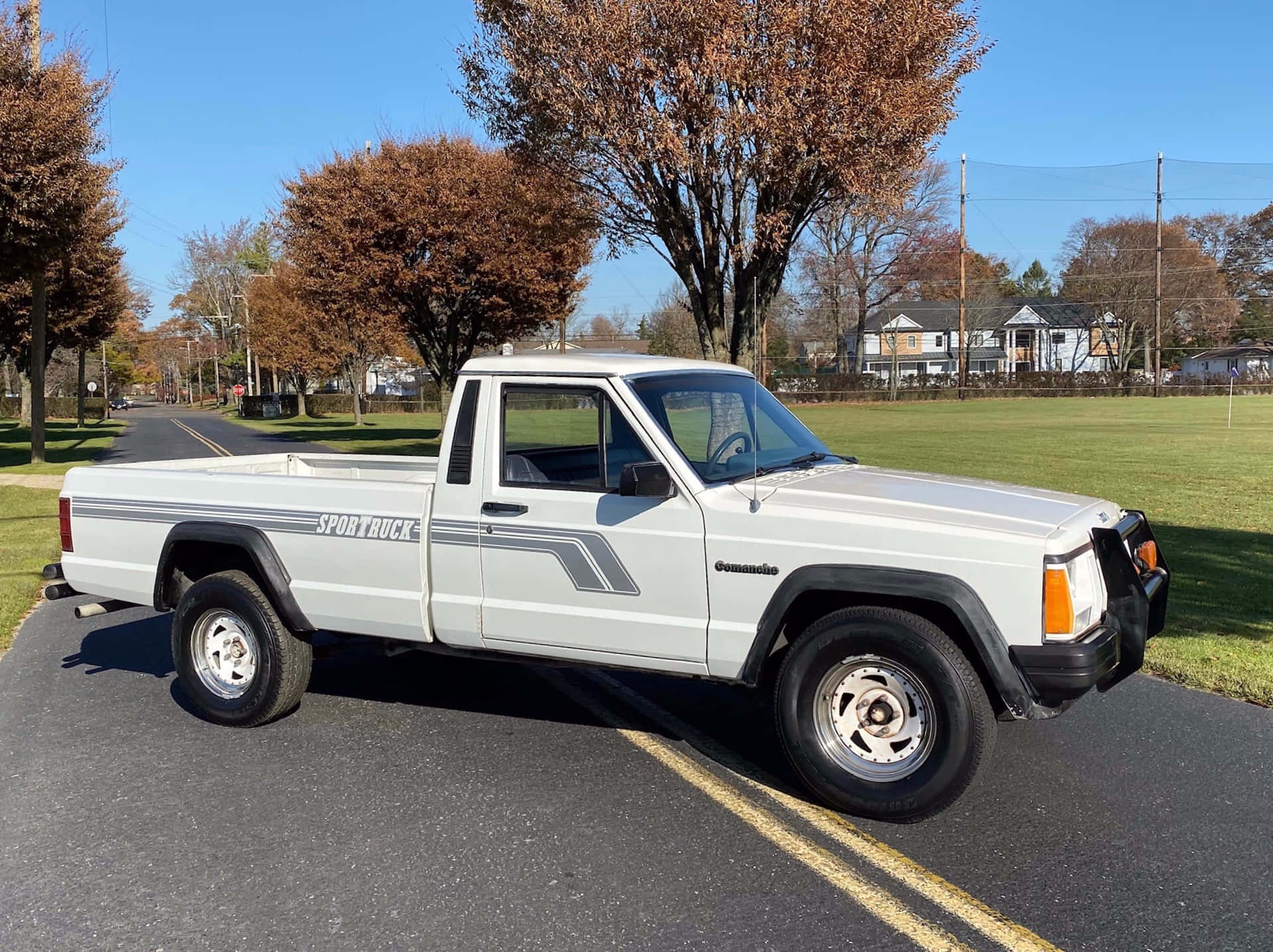 Jeep Comanche Mettant En Valeur Son Design Robuste Et Ses Capacités Tout-terrain Fond d'écran