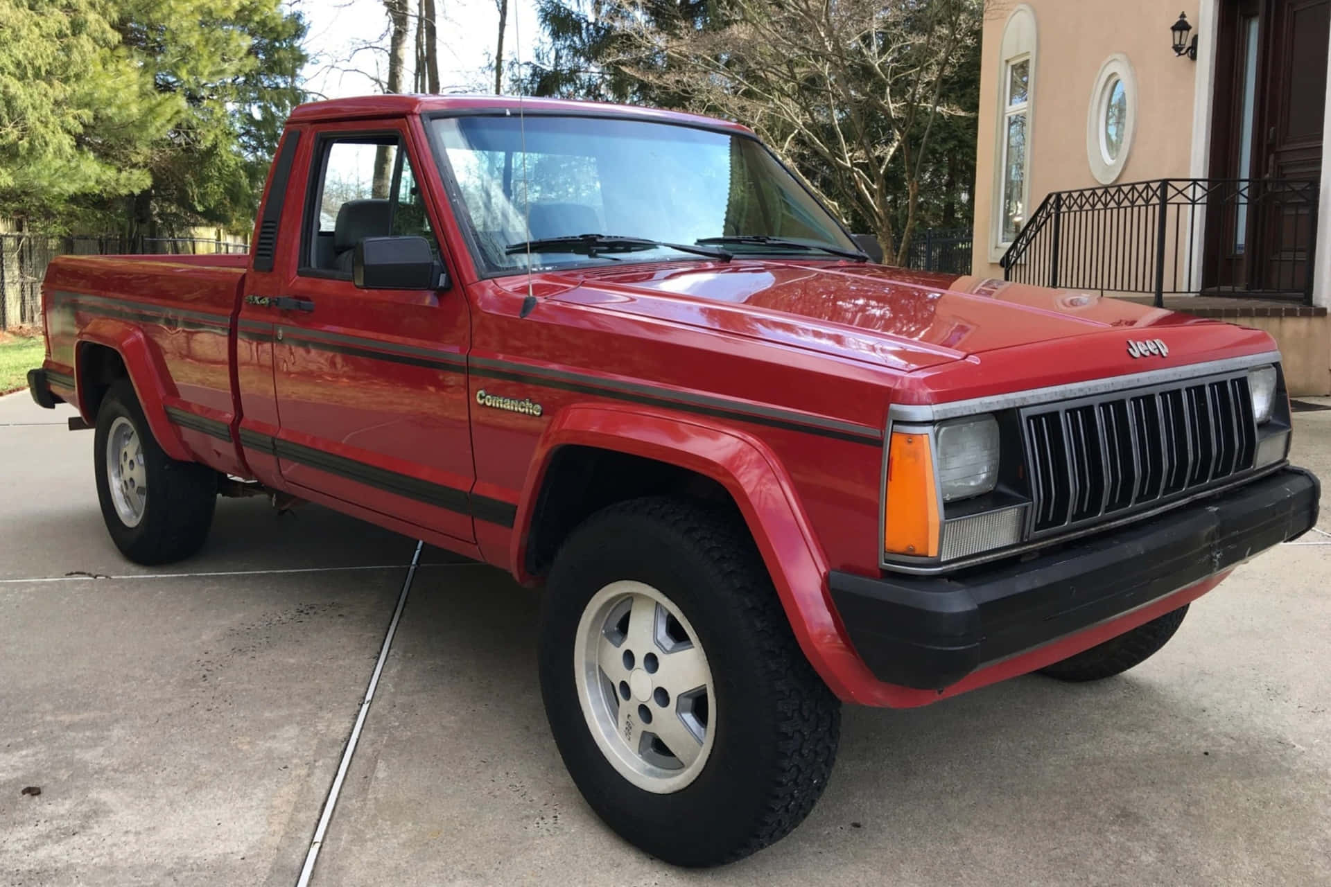 Vintage Jeep Comanche Tutkimassa Suurta Luontoa Taustakuva