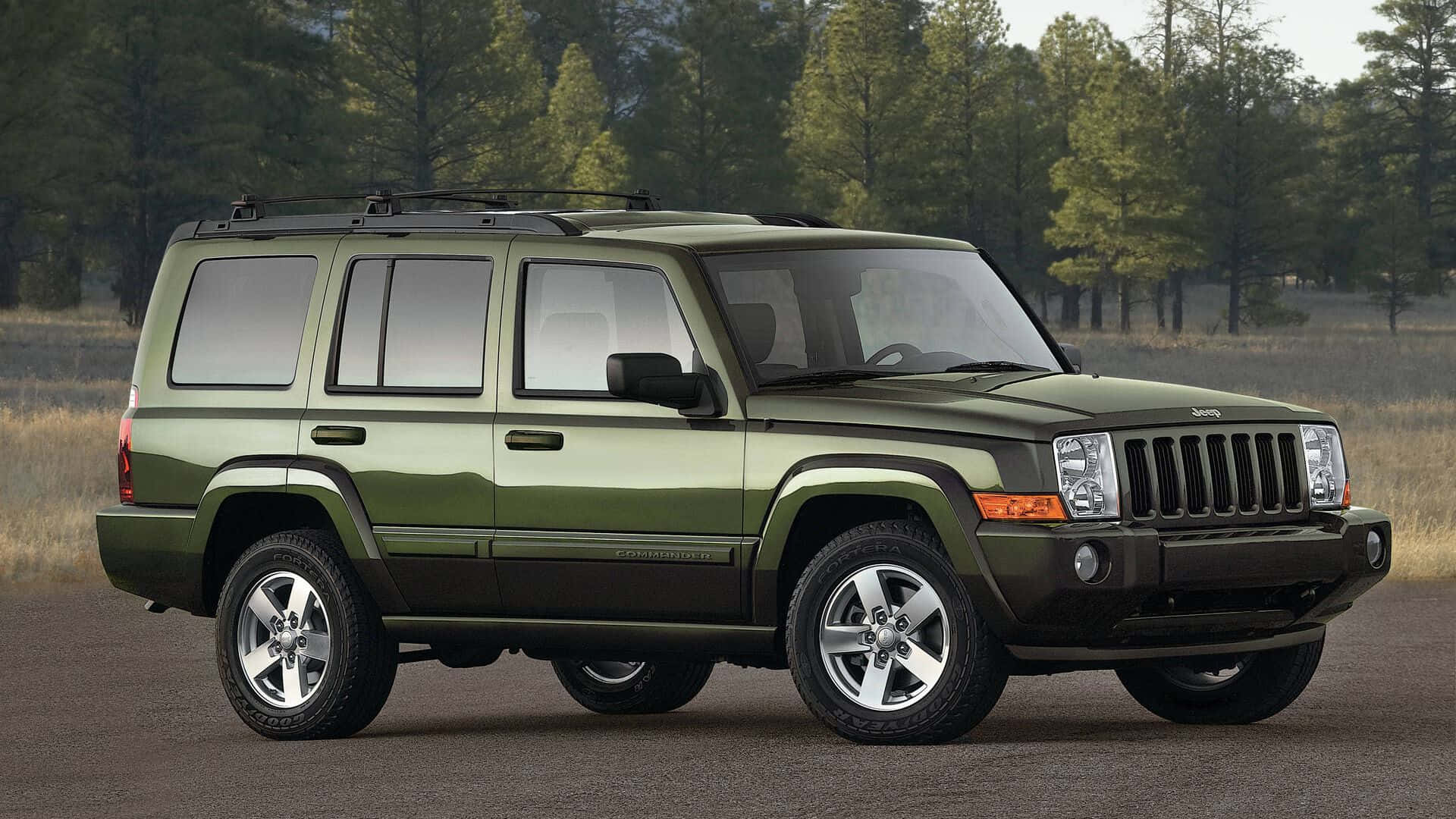 Jeep Commander På Et Fjellventyr Bakgrunnsbildet