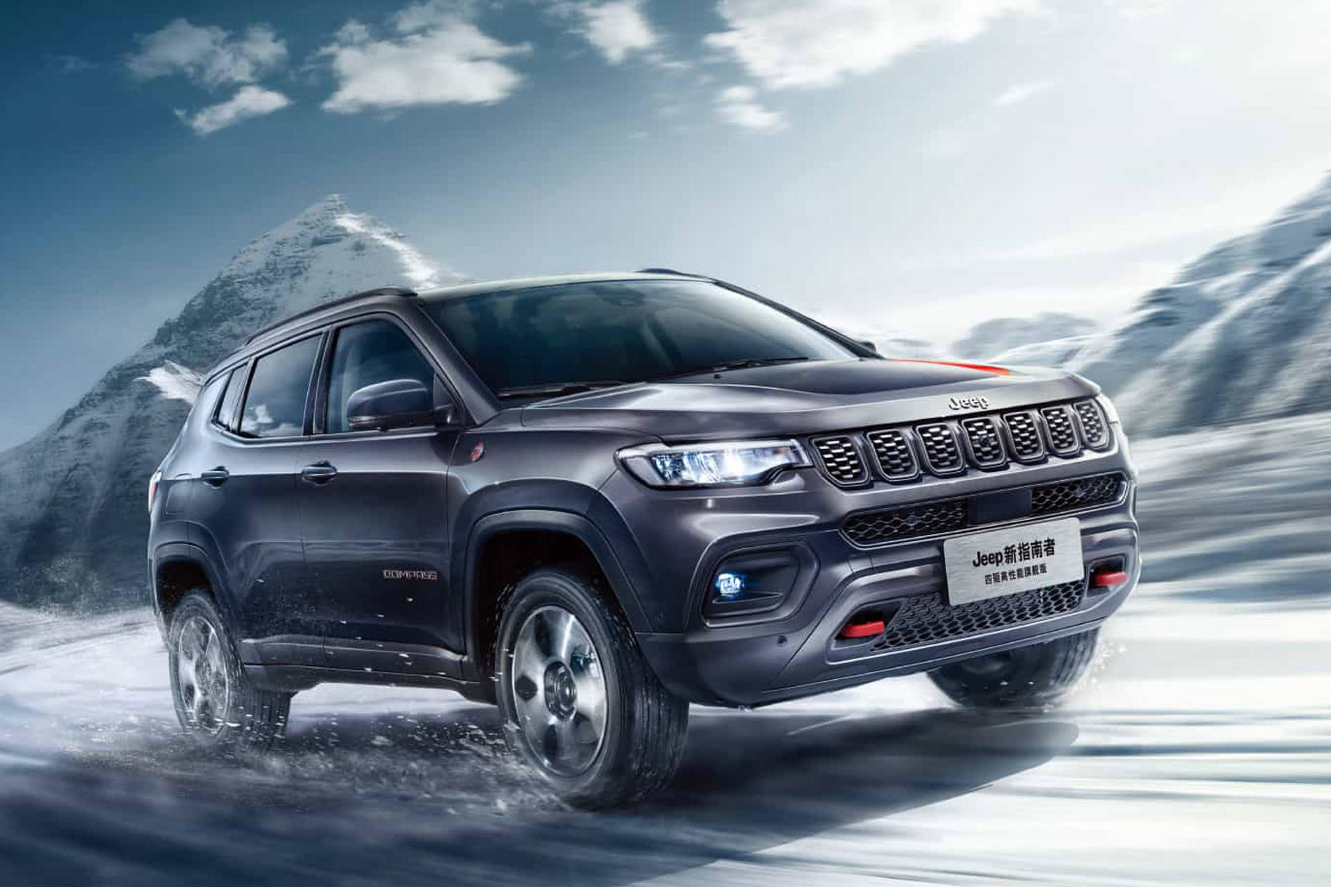 Jeep Compass On Snow With Mountains Wallpaper