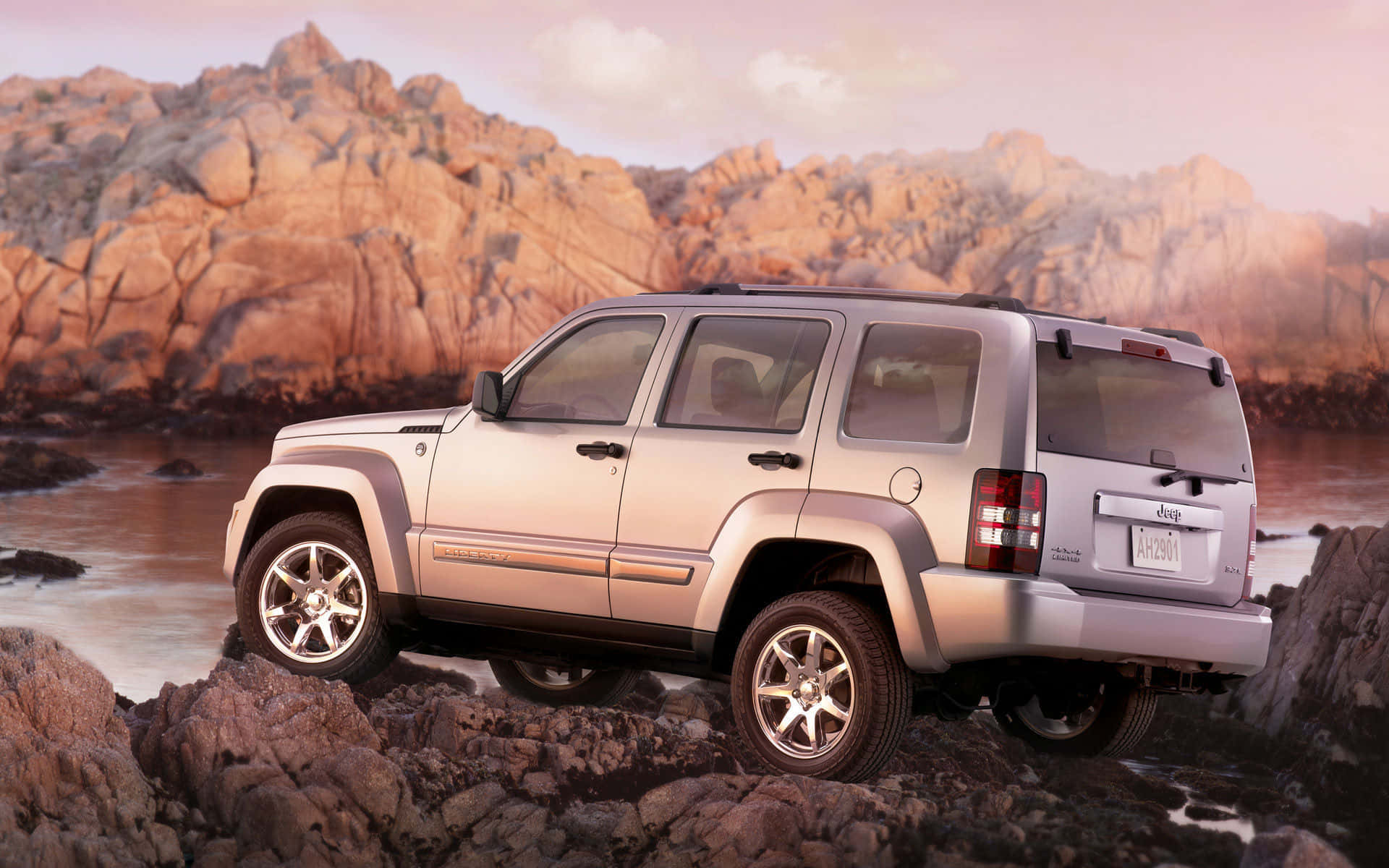 Mighty Jeep Liberty conquering tough terrain Wallpaper