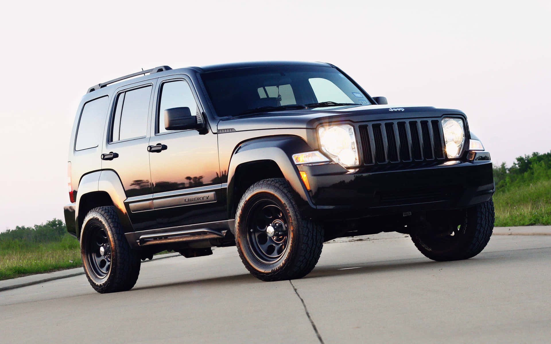 Jeep Liberty - A Powerful Off-Road Adventure Wallpaper
