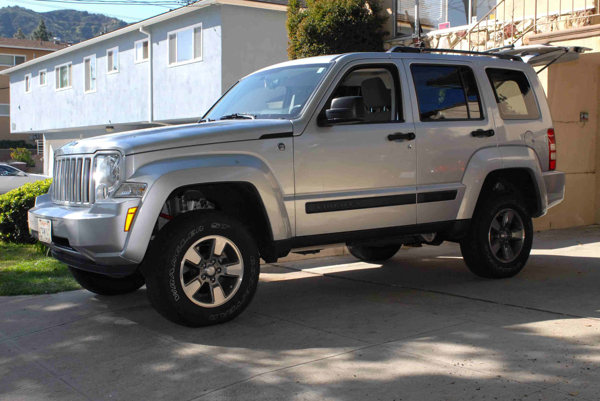 Rugged Jeep Liberty conquering the wilderness Wallpaper