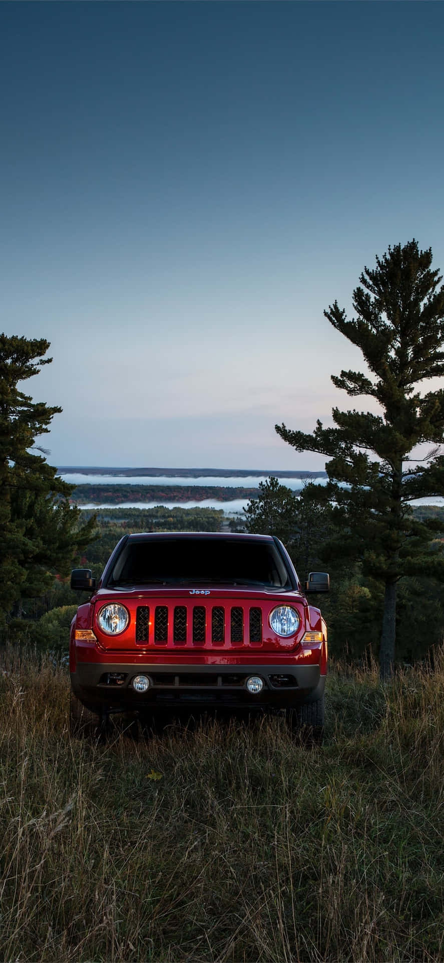 Bold and Adventurous Jeep Patriot Off-Roading Wallpaper