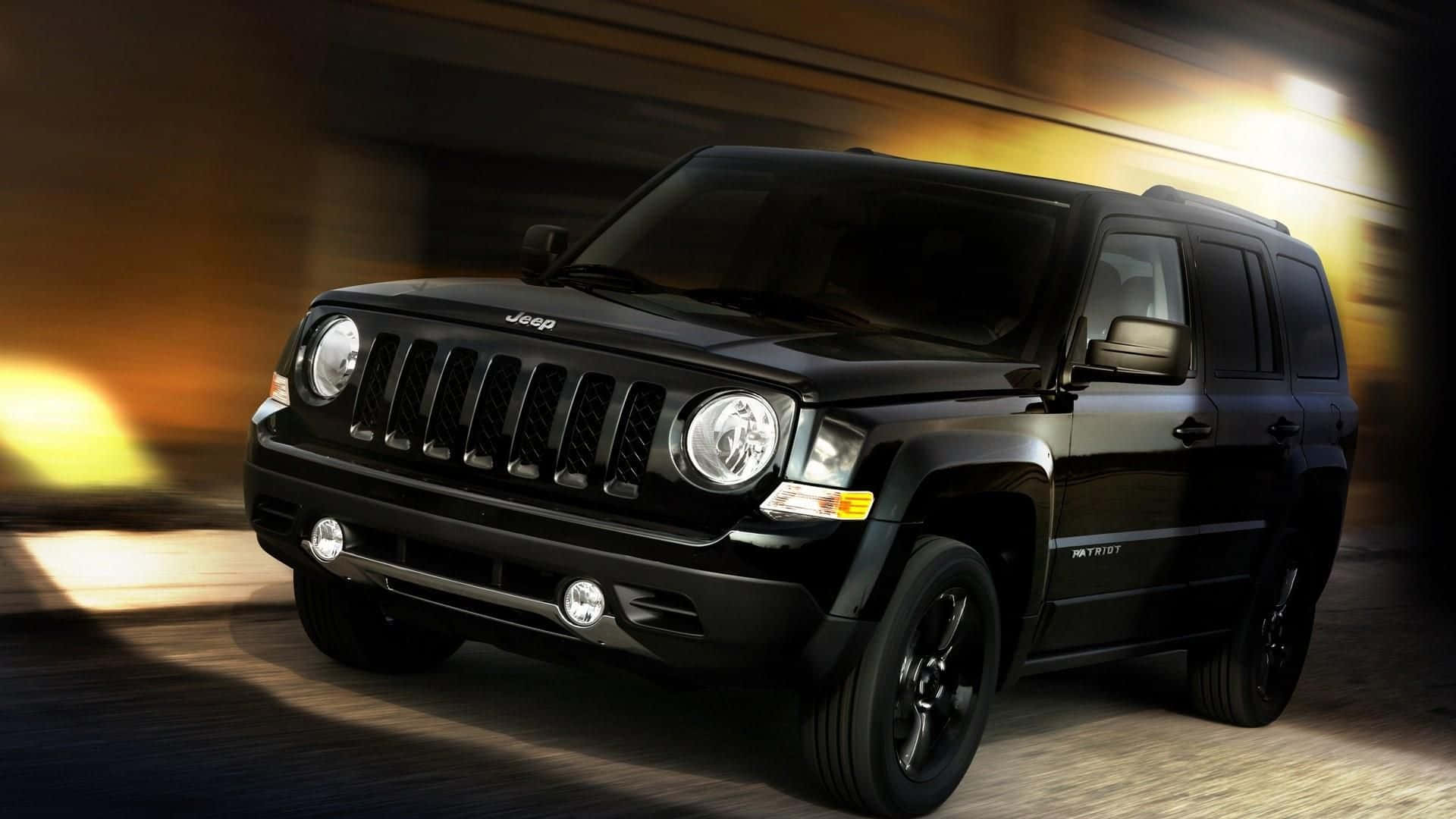 Rugged Jeep Patriot on an off-road adventure Wallpaper