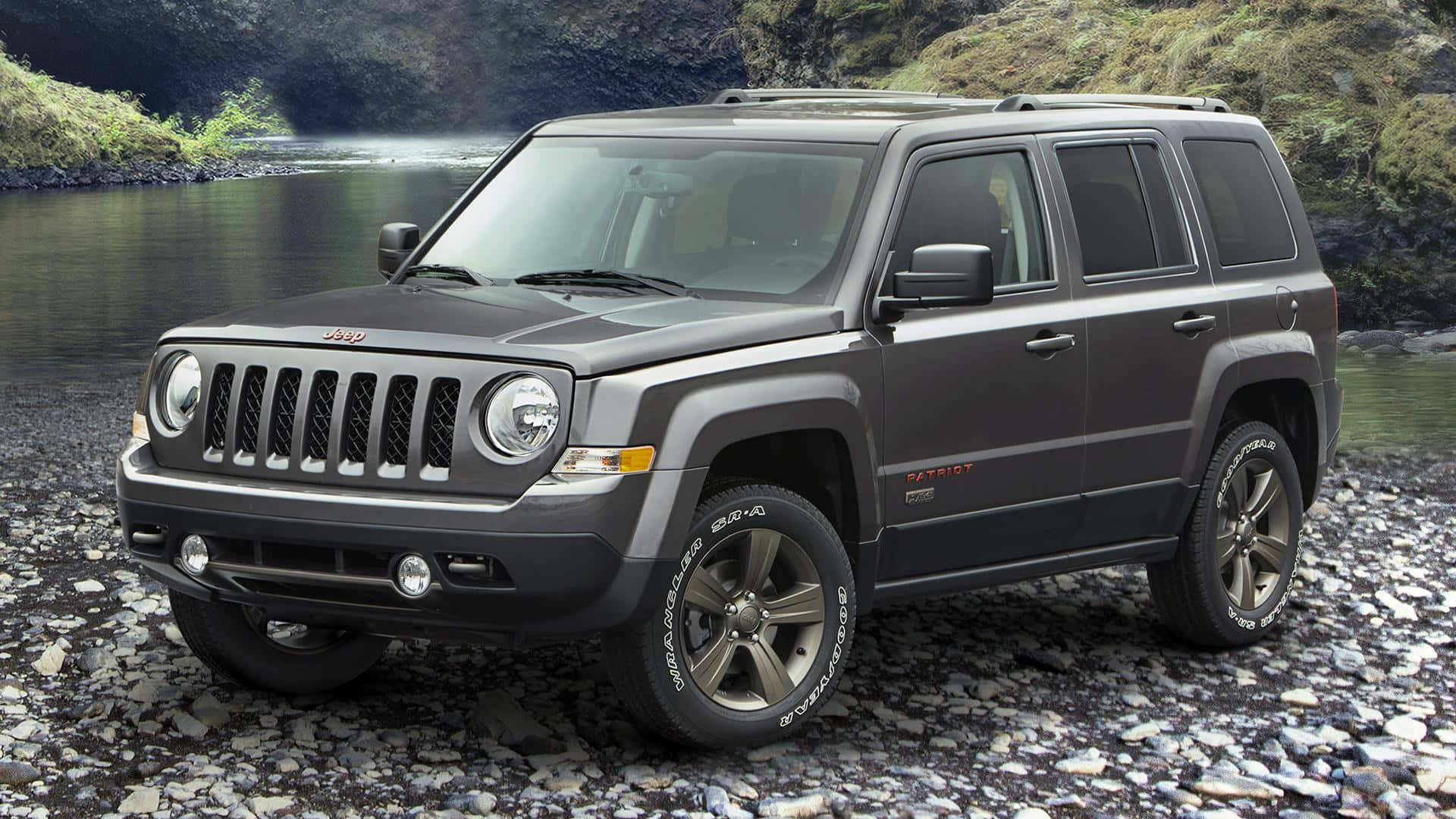 Caption: Rugged Jeep Patriot SUV on an Off-Road Adventure Wallpaper