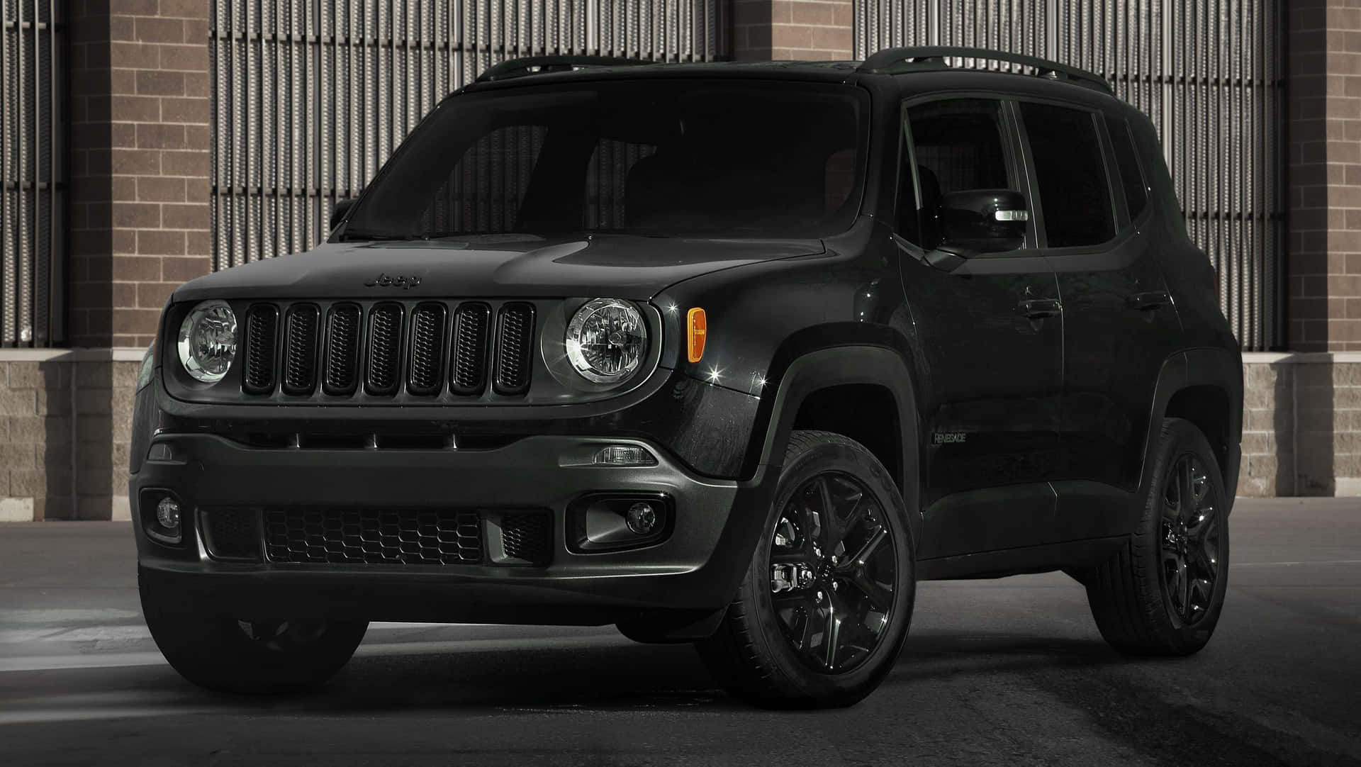 Stylish Jeep Renegade on a Scenic Off-road Adventure Wallpaper