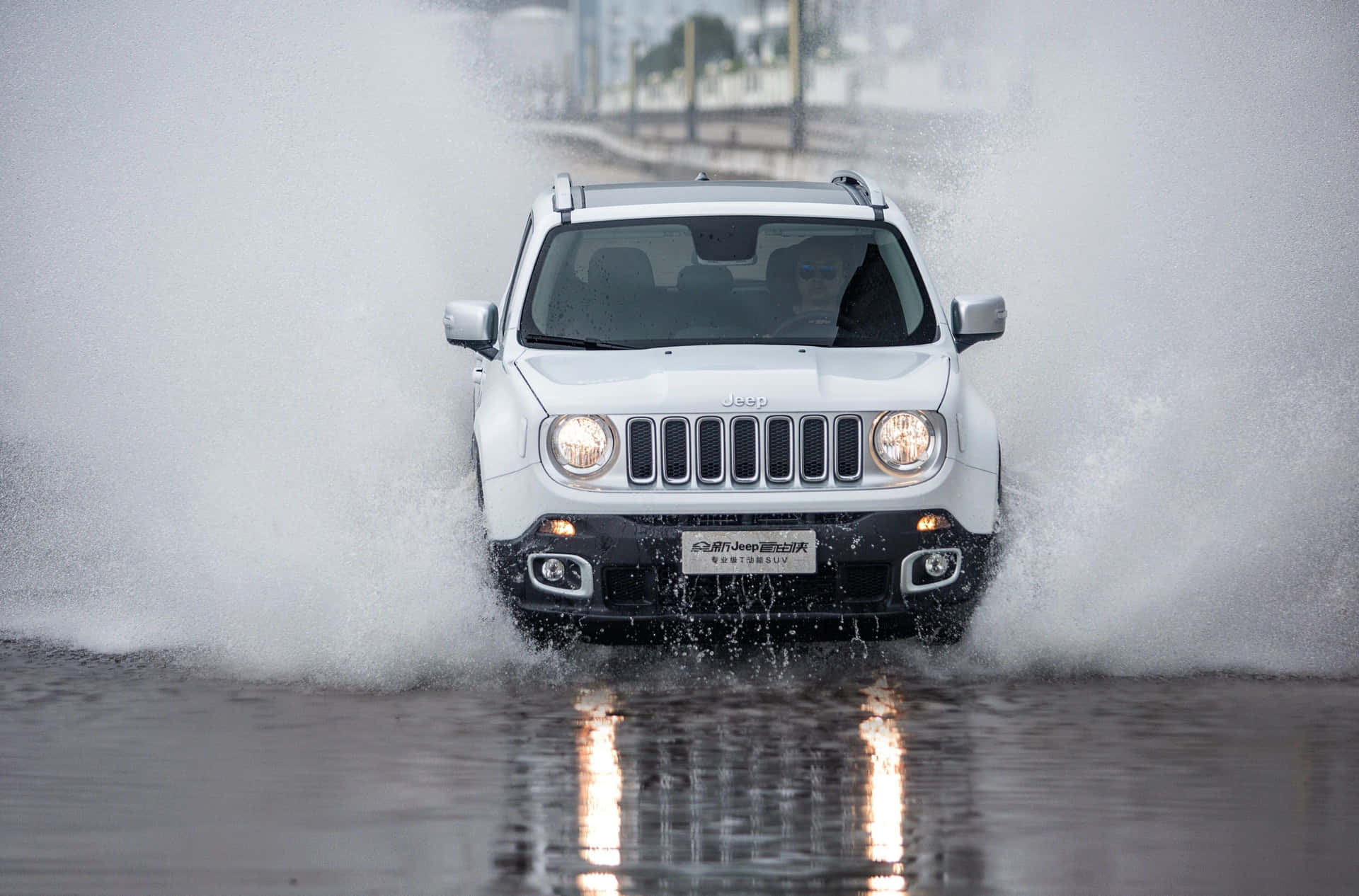 Adventure-Ready Jeep Renegade on Scenic Off-Road Terrain Wallpaper