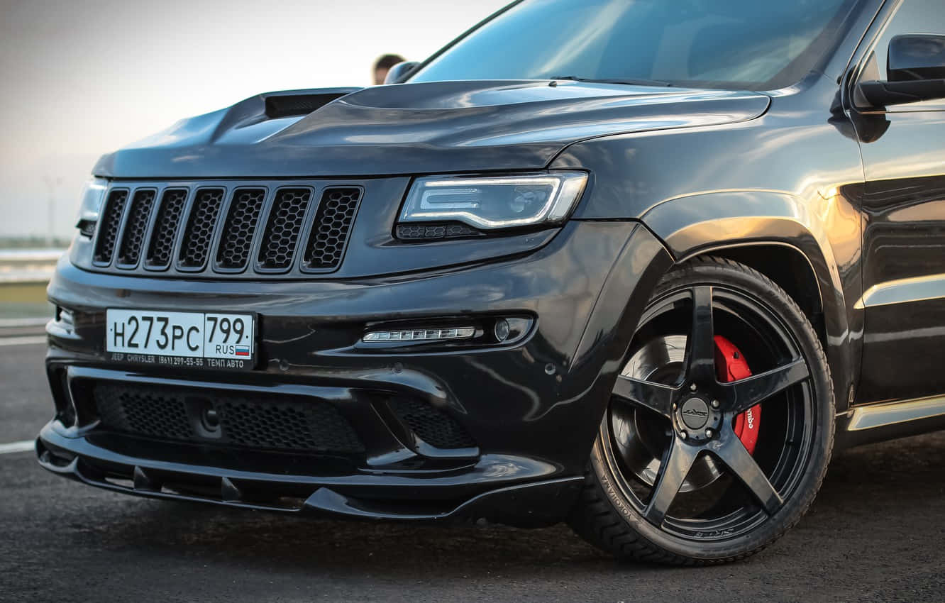 Explore The Rugged Capability Of The Jeep Trackhawk Wallpaper