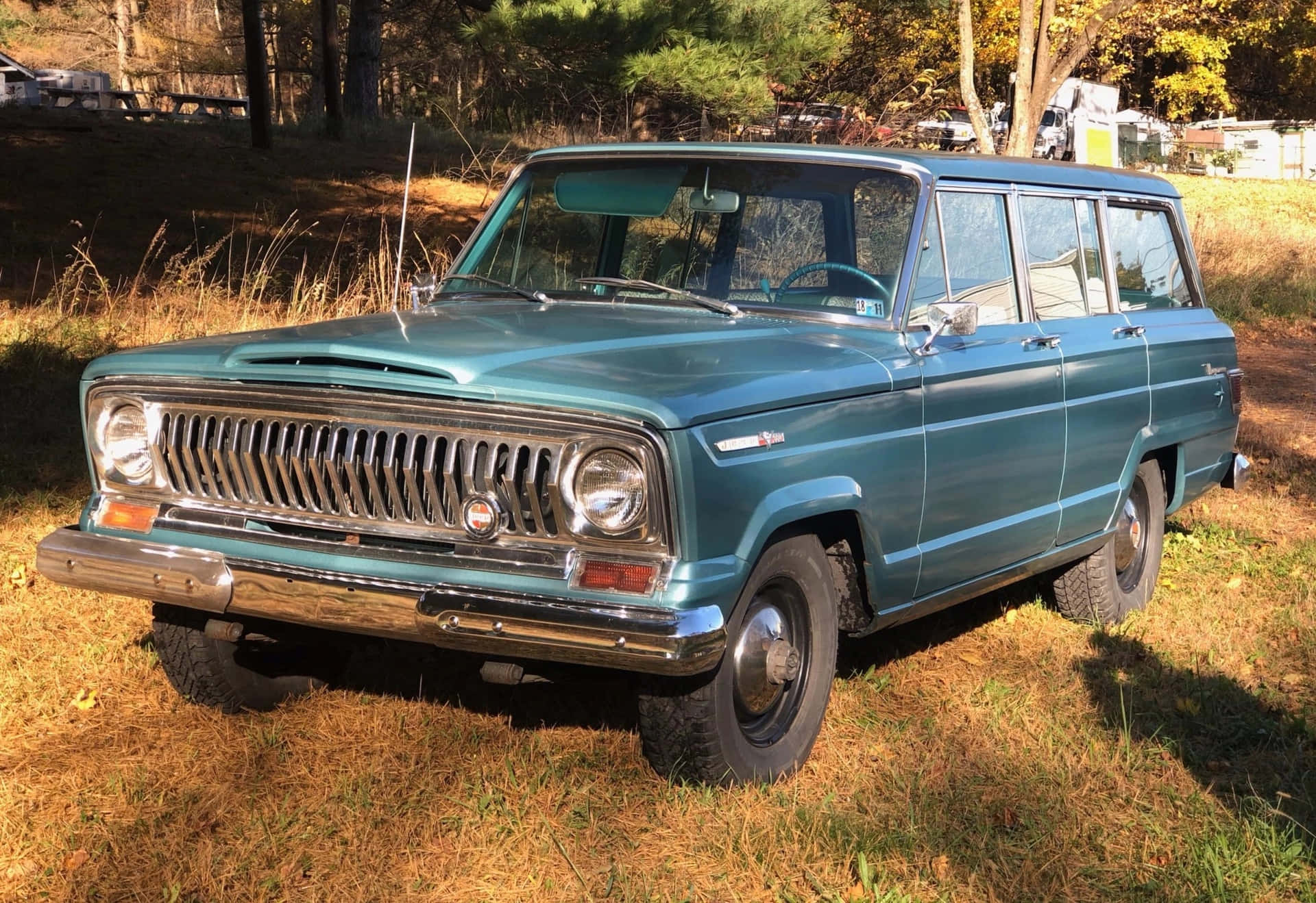 Vintage Jeep Wagoneer in the Wilderness Wallpaper