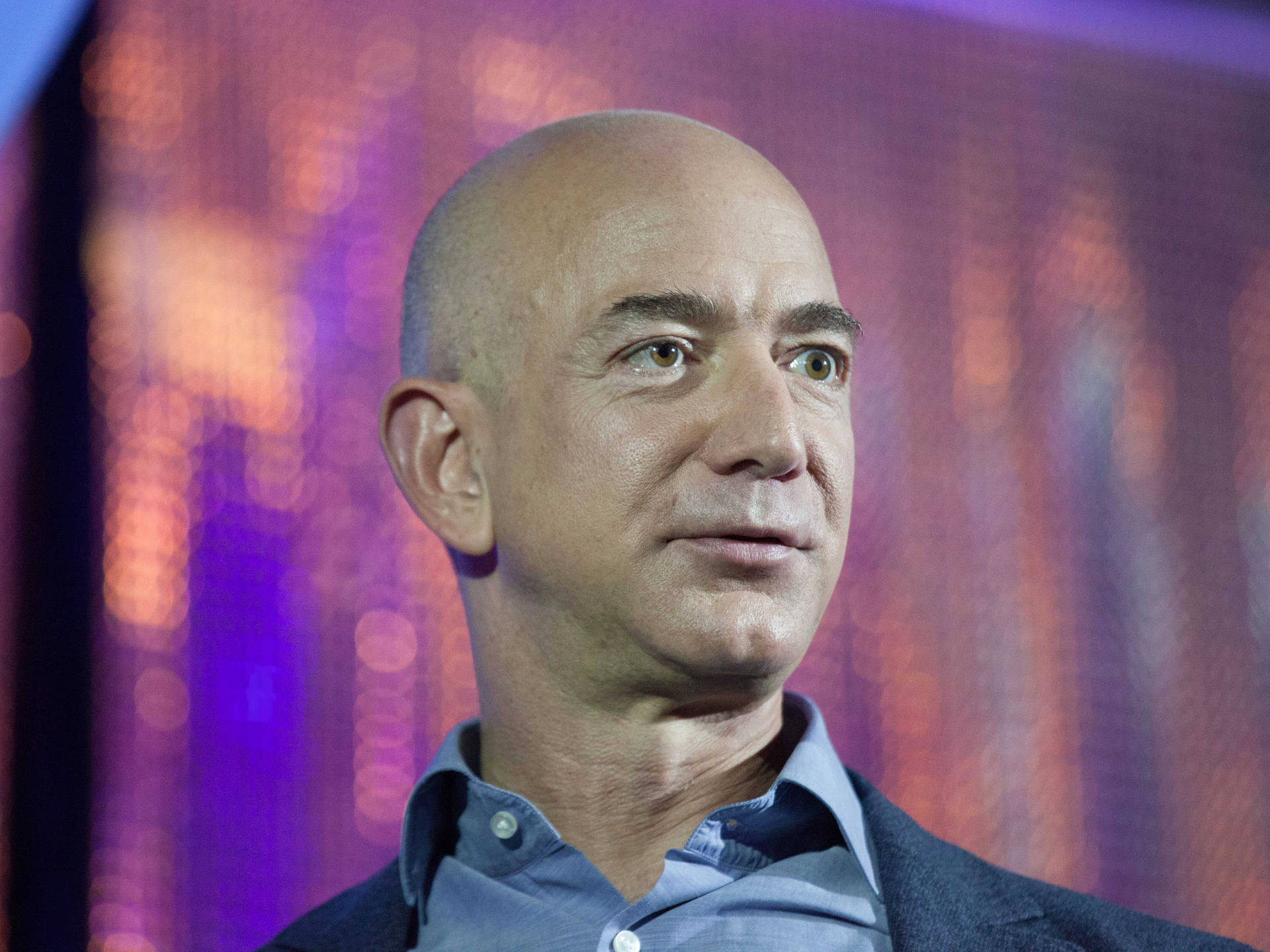 Jeff Bezos Against Sparkly Background Wallpaper