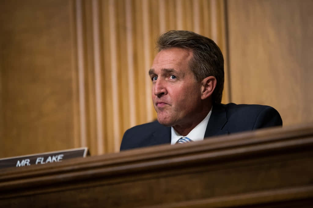 Jeff Flake On Conference Table Wallpaper