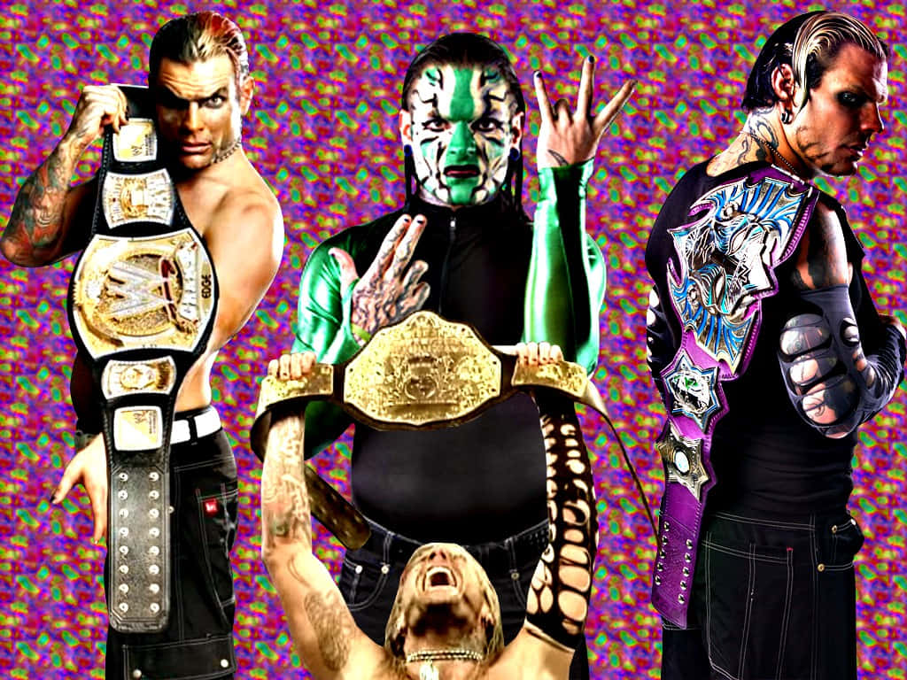 Jeff Hardy Holding Different Championship Belts Picture