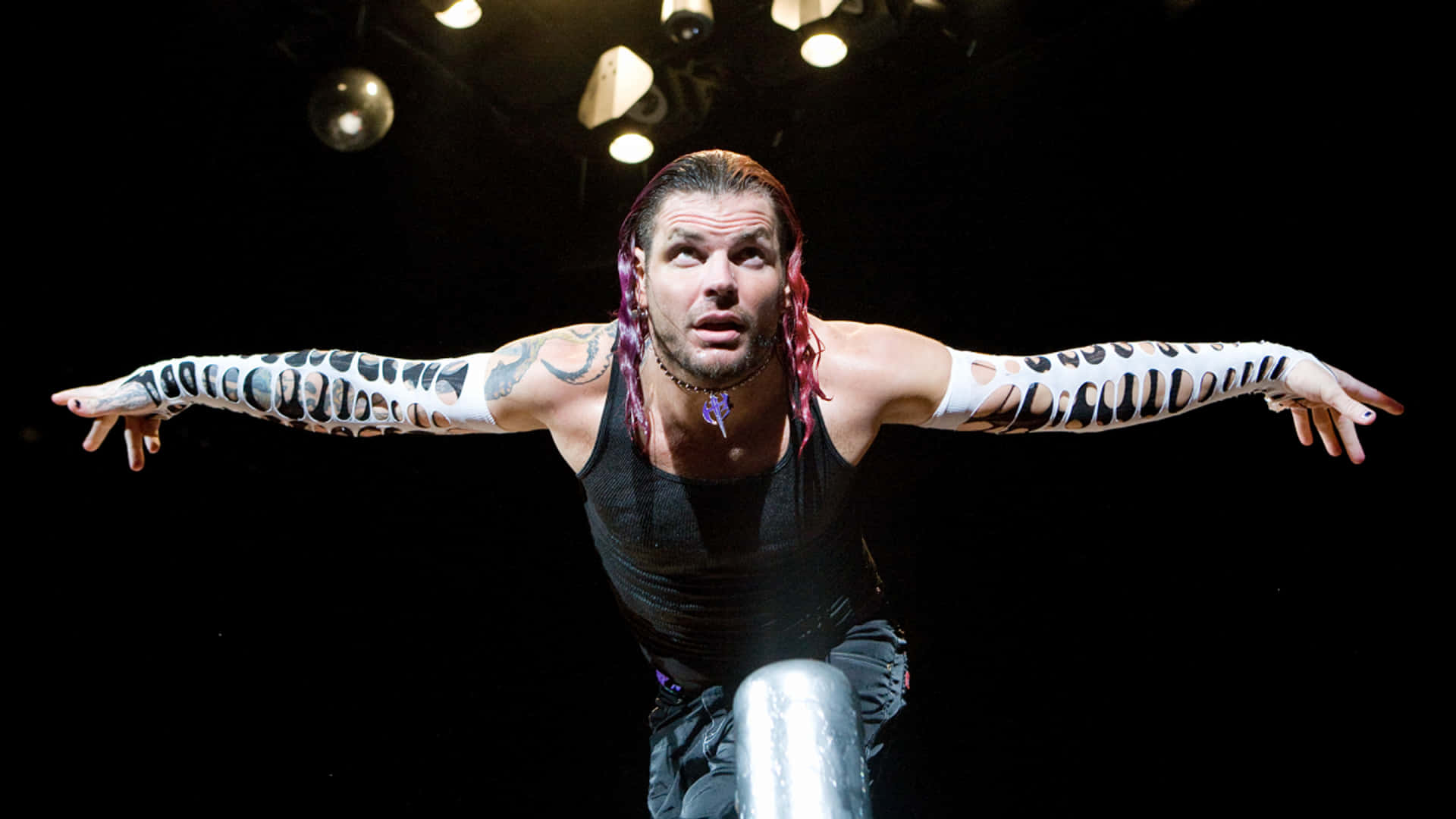 Jeff Hardy Kneeling As He Bows Elegantly Picture