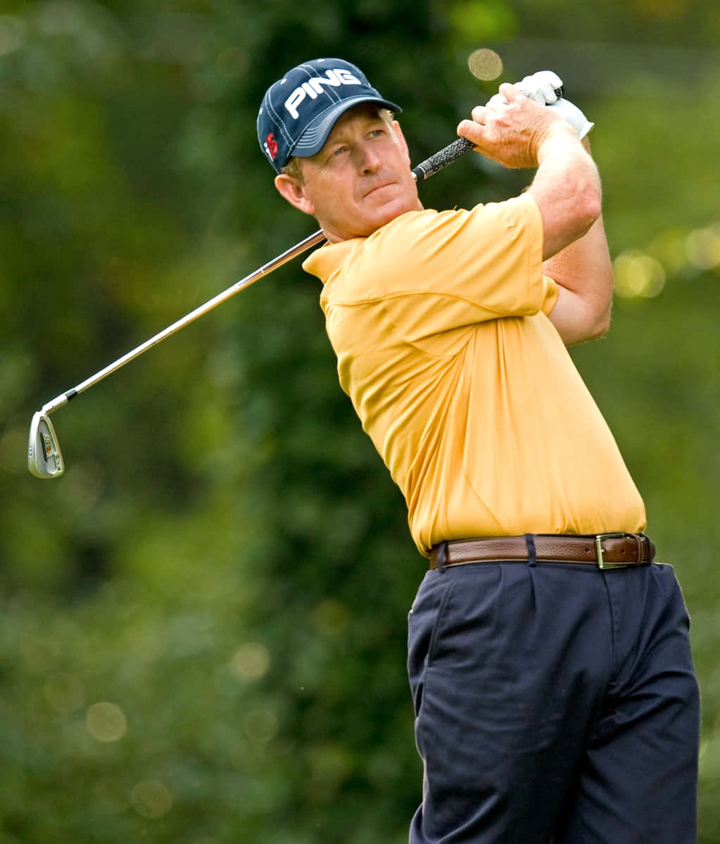 Jeff Maggert In Action During A Golf Tournament Wallpaper