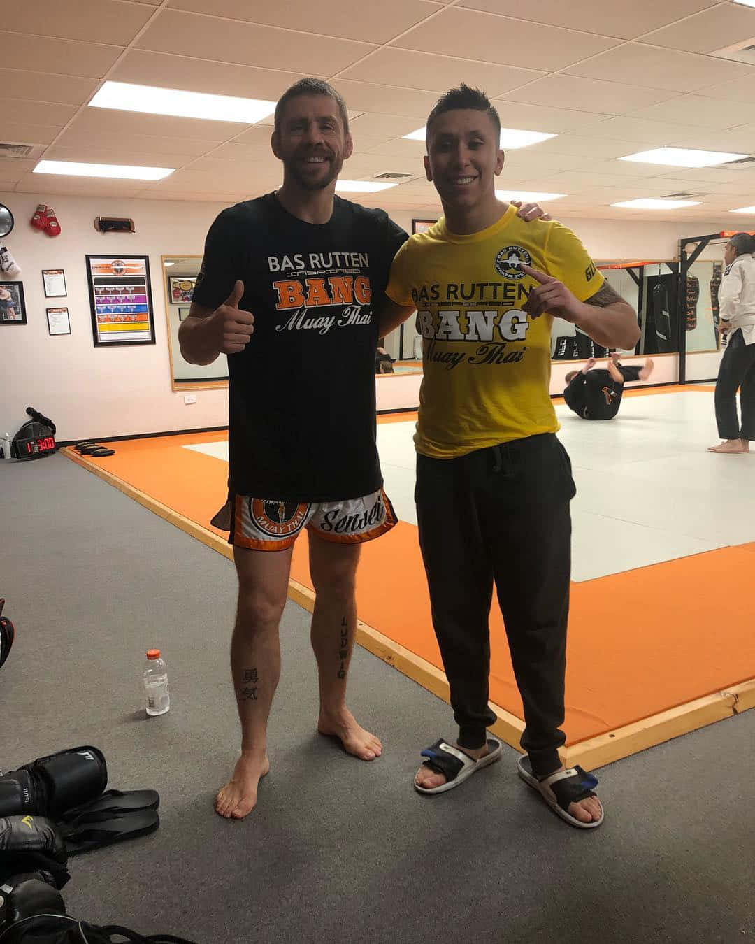Jeff Molina With Man After Training Background