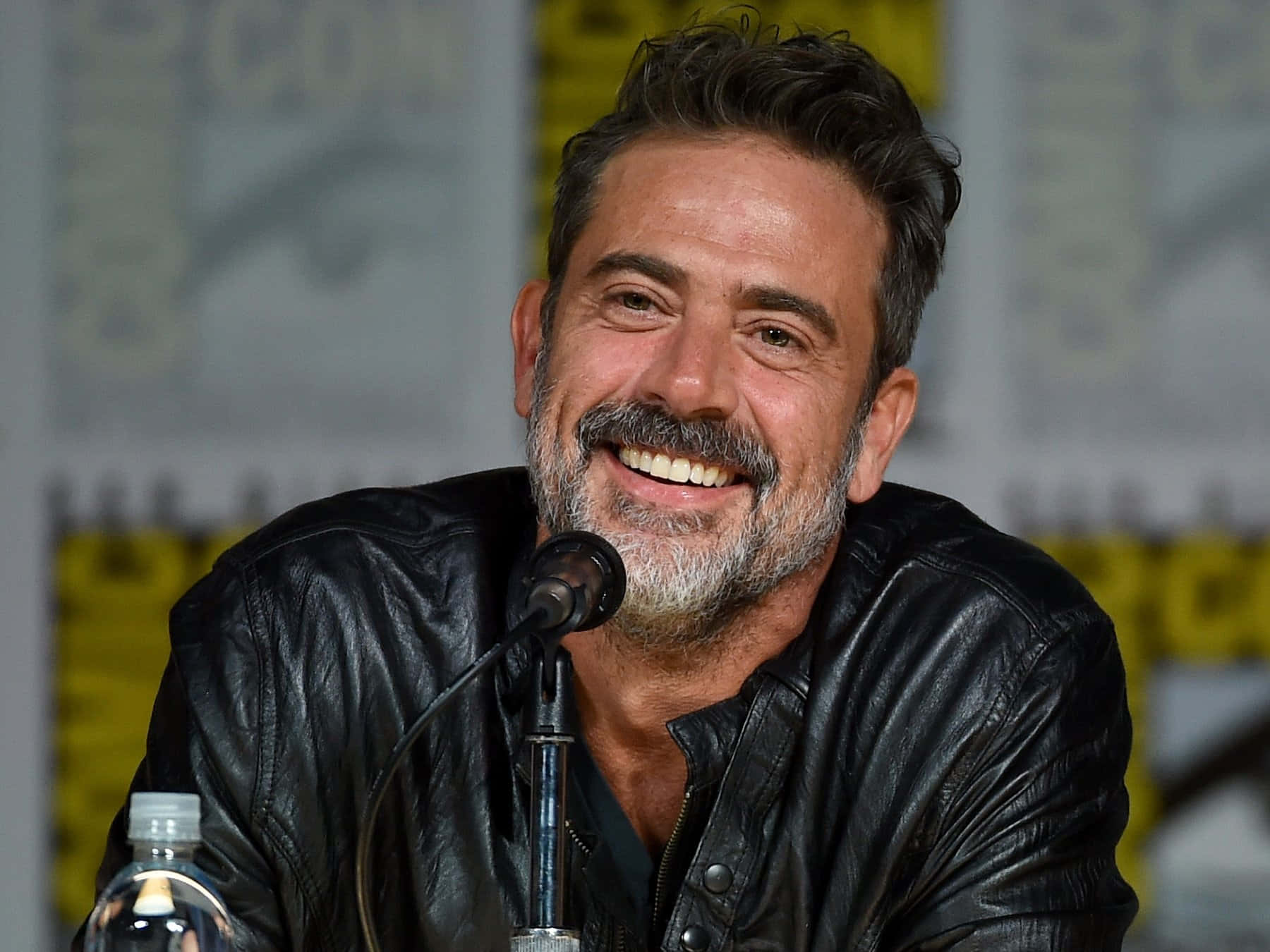 Prominent Hollywood actor Jeffrey Dean Morgan posing during an event. Wallpaper