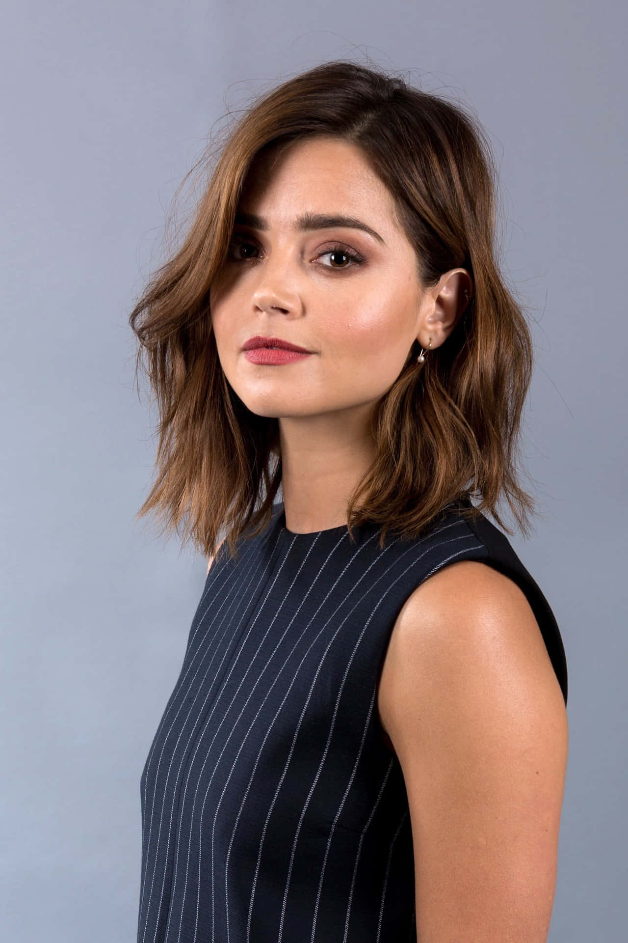 Jenna Coleman in a stylish outfit Wallpaper
