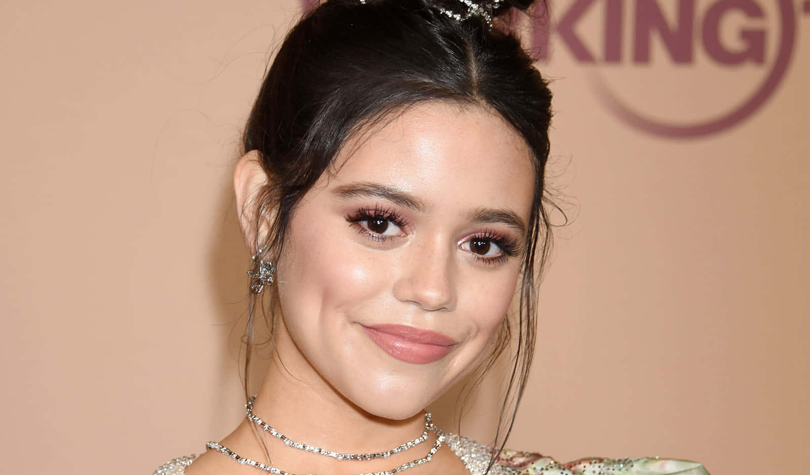 Jenna Ortega Smiling Event Appearance Wallpaper