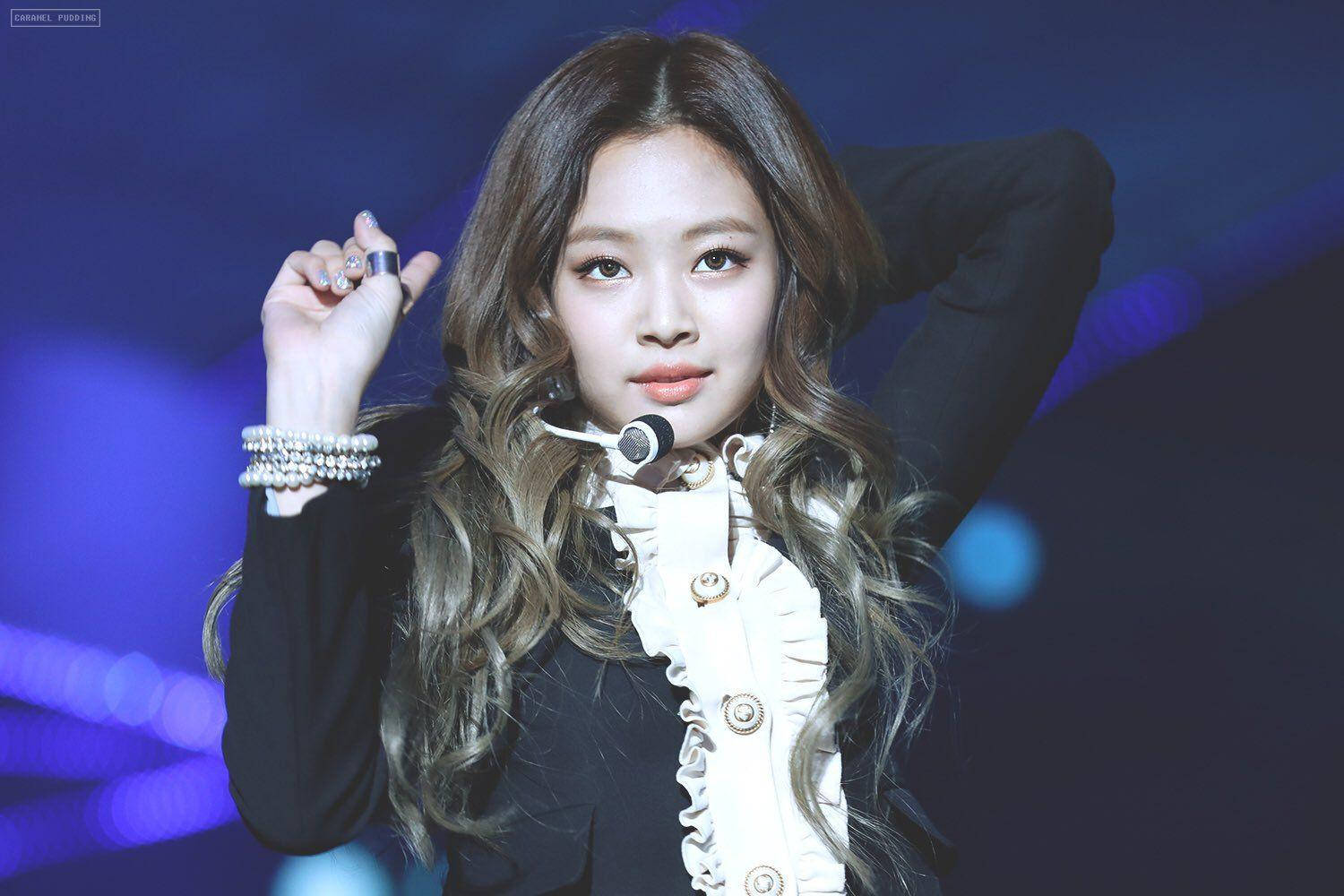Download Jennie Kim Dancing On Stage Wallpaper | Wallpapers.com