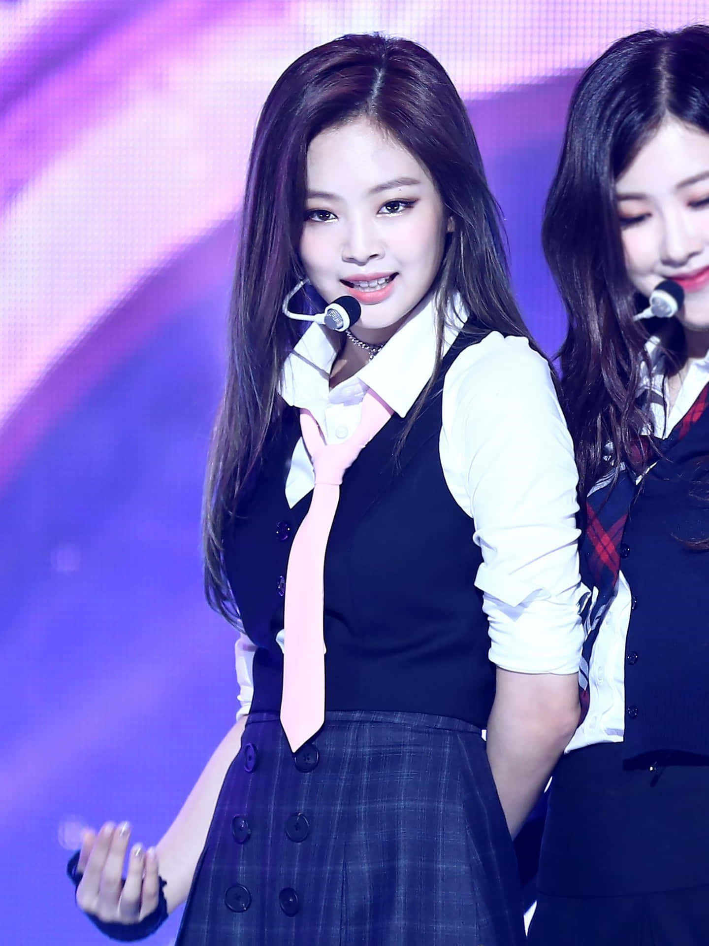 Singer Jennie Kim pictured in a Red Velvet suit