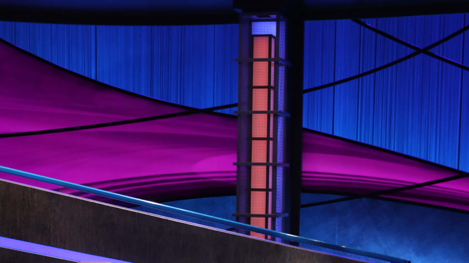 A Purple And Blue Stage With A Staircase