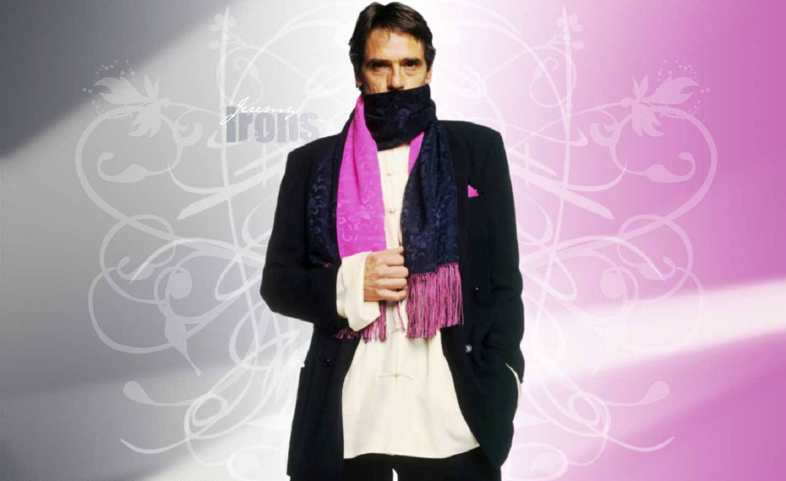 Jeremyirons Med En Rosa Halsduk. (this Sentence Would Work As A Description For A Wallpaper Featuring Jeremy Irons Wearing A Pink Scarf.) Wallpaper