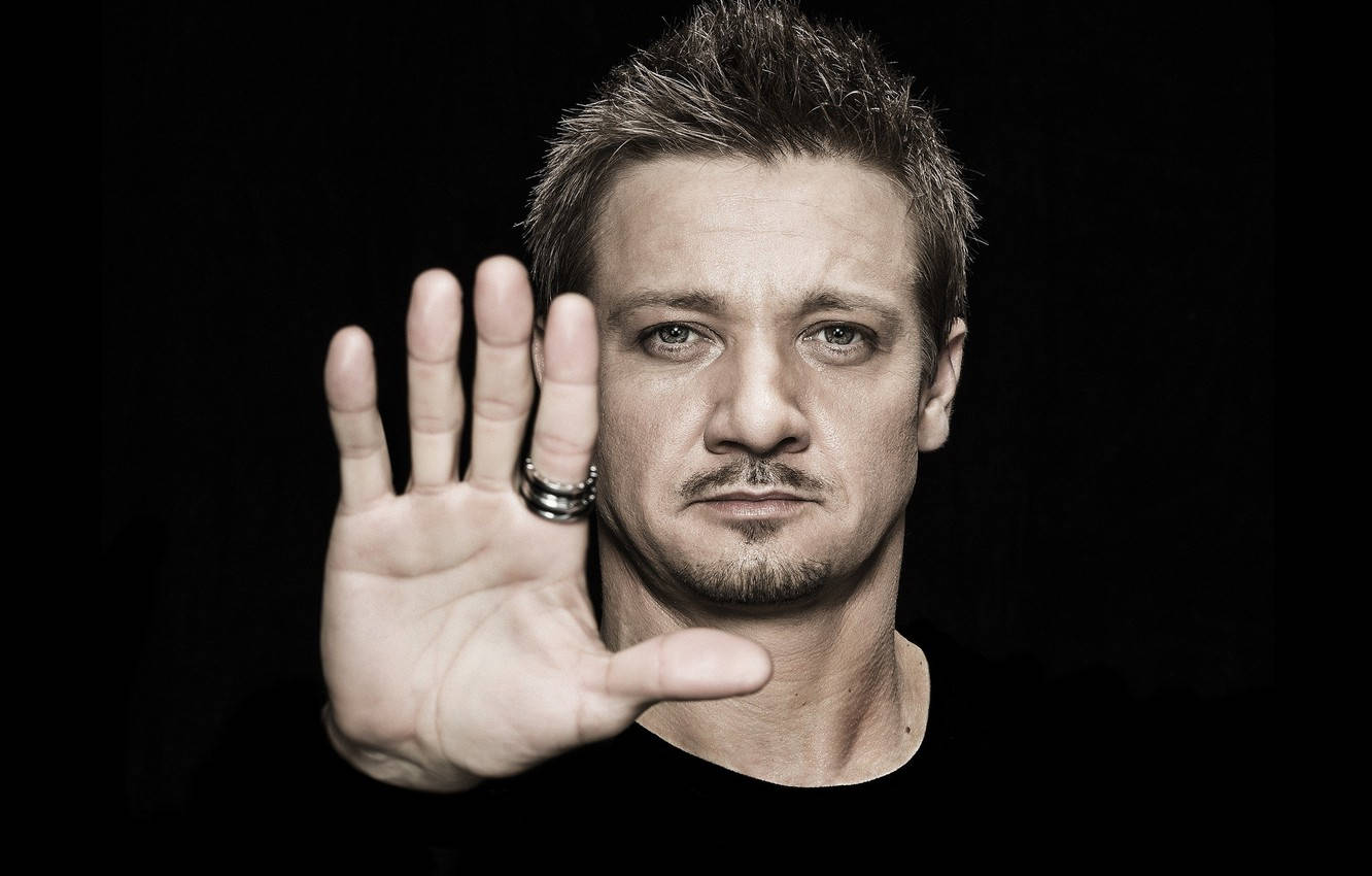 Jeremy Renner With An Open Palm Wallpaper