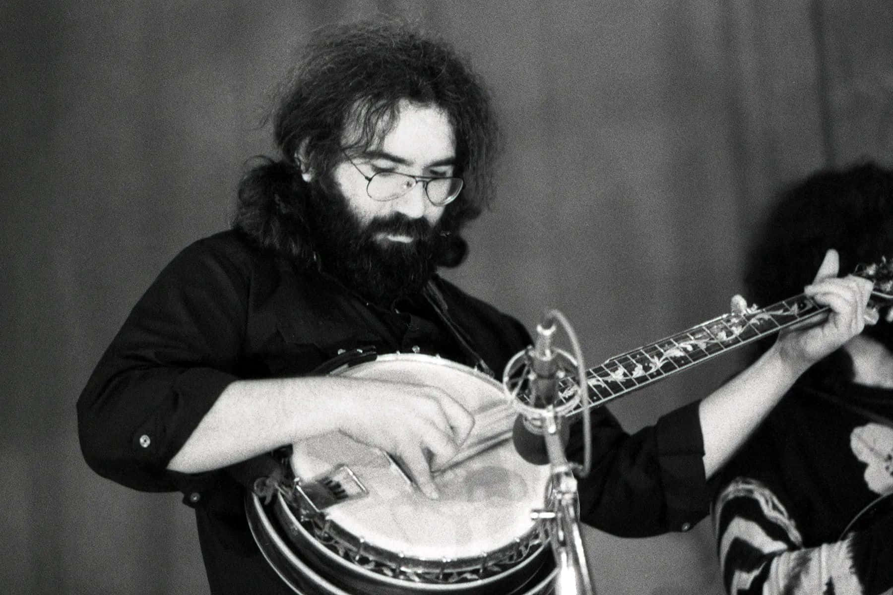 Jerry Garcia Playing Banjo Blackand White Wallpaper