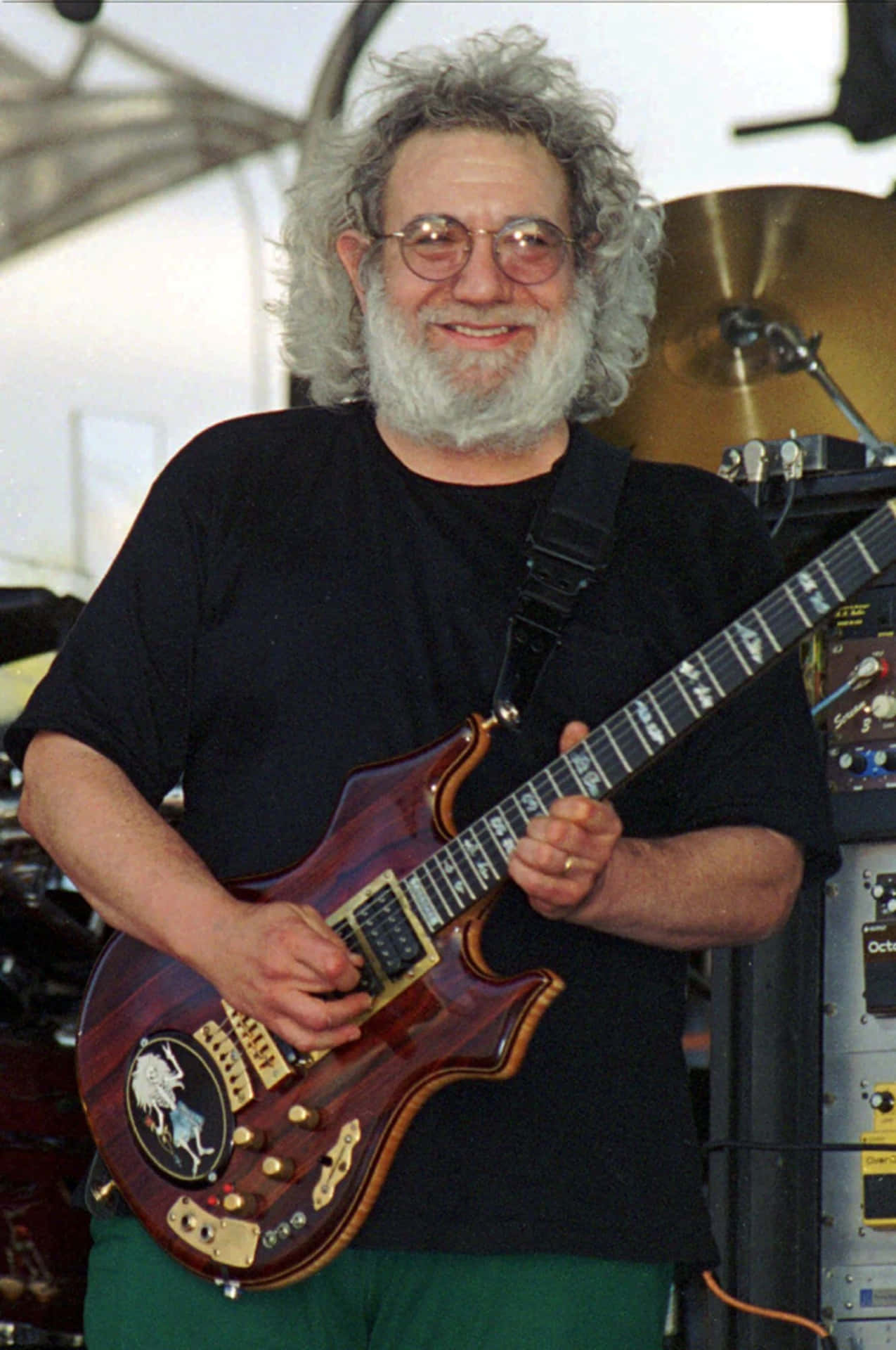 Jerry_ Garcia_ Playing_ Guitar_ Onstage Wallpaper