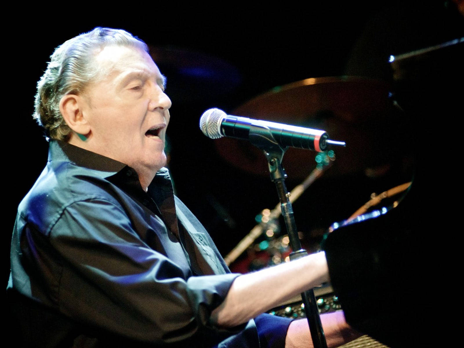 Jerry Lee Lewis Singing With Microphone Piano