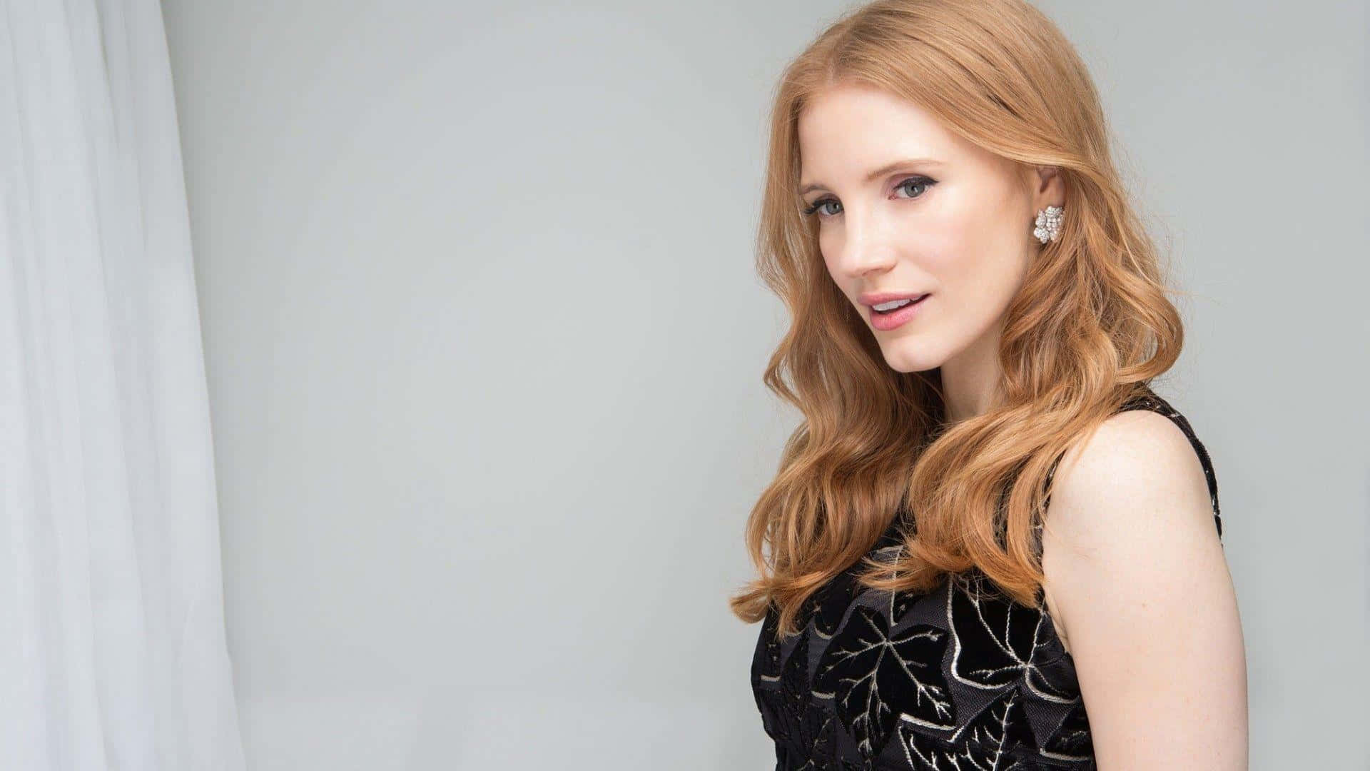 Jessica Chastain Radiant Close-Up Portrait Wallpaper