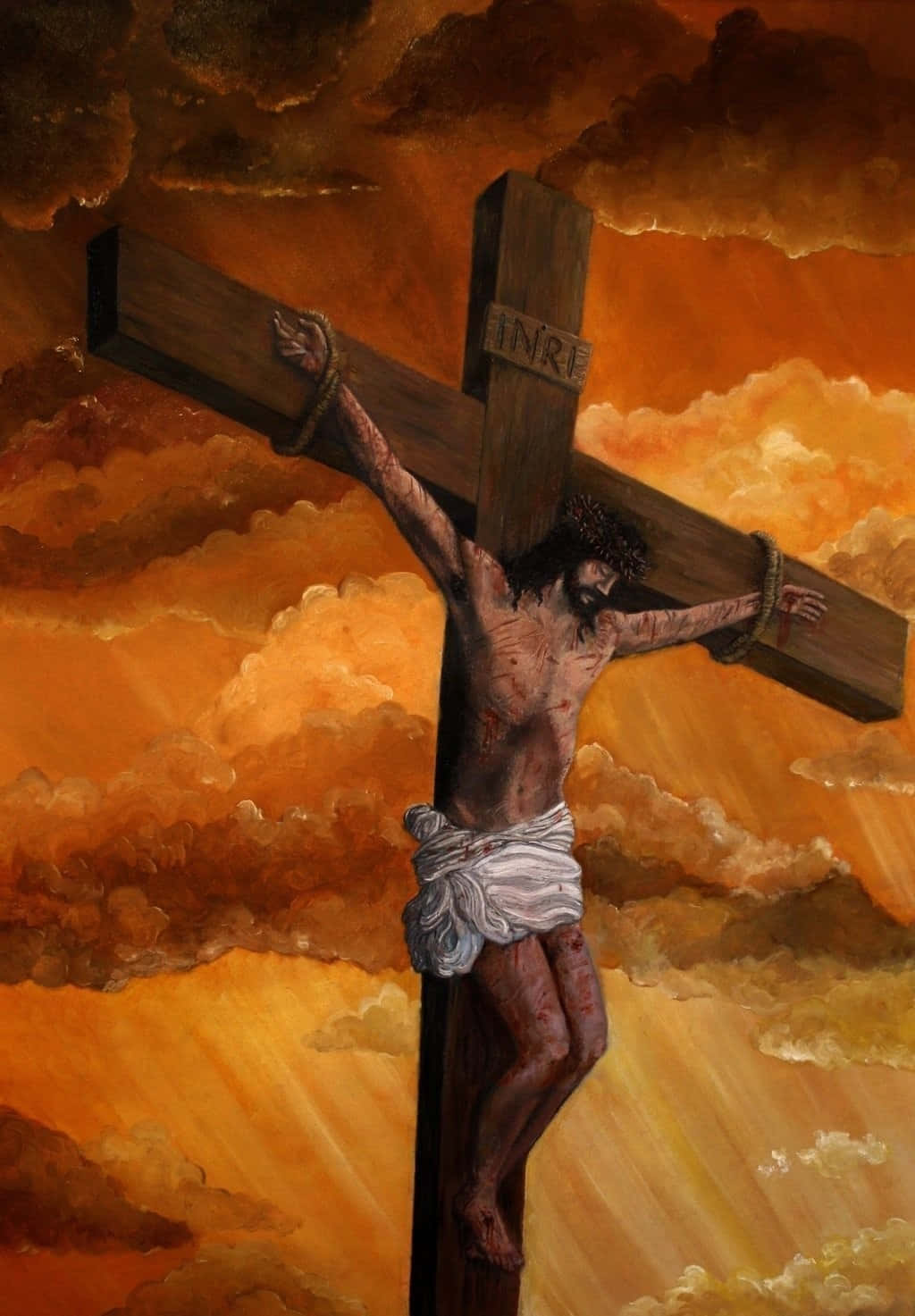 The Solemn Moment of Jesus' Crucifixion on the Cross Wallpaper