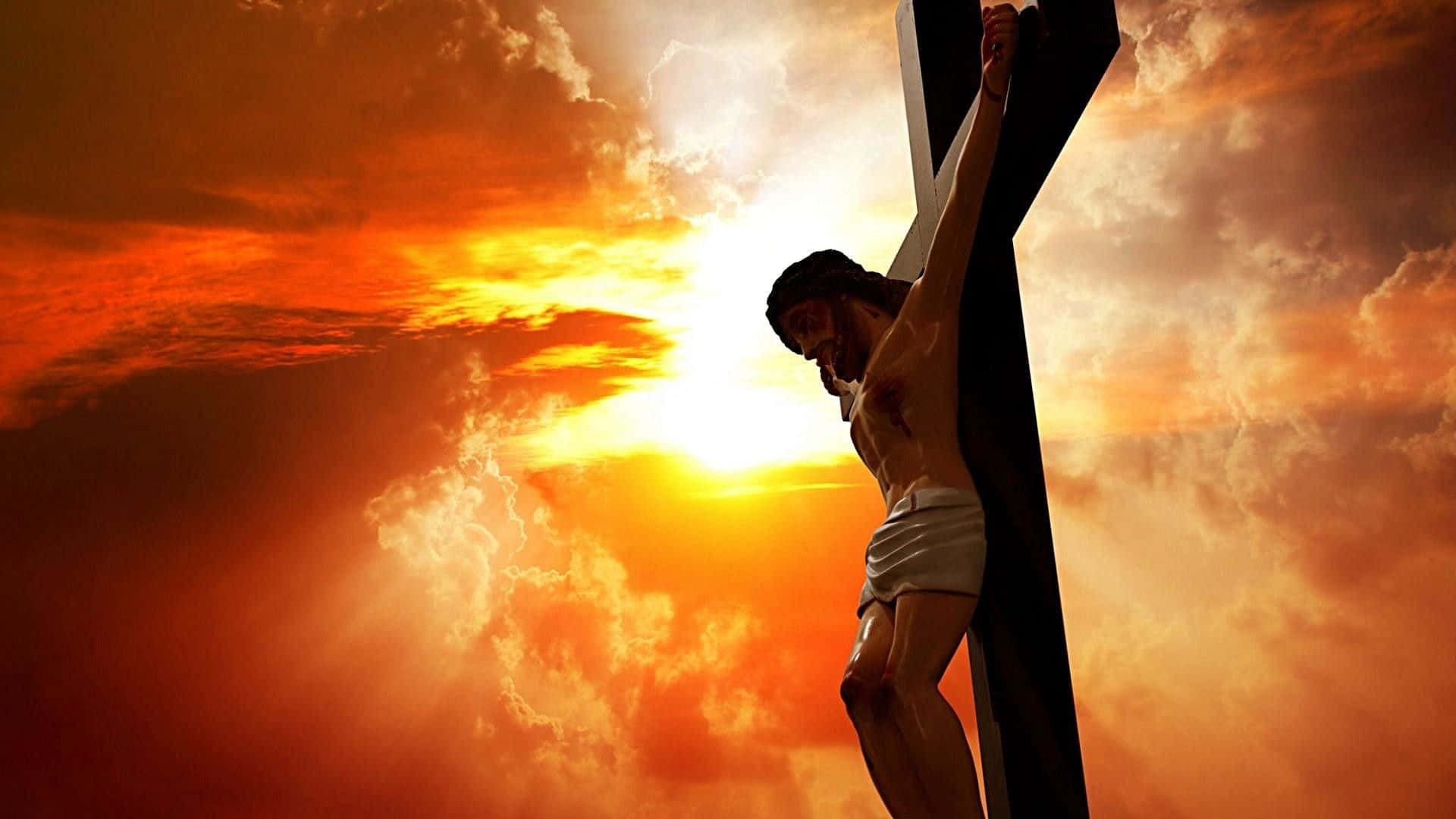 Jesuspå Korset Med En Strålande Solnedgångsbild.