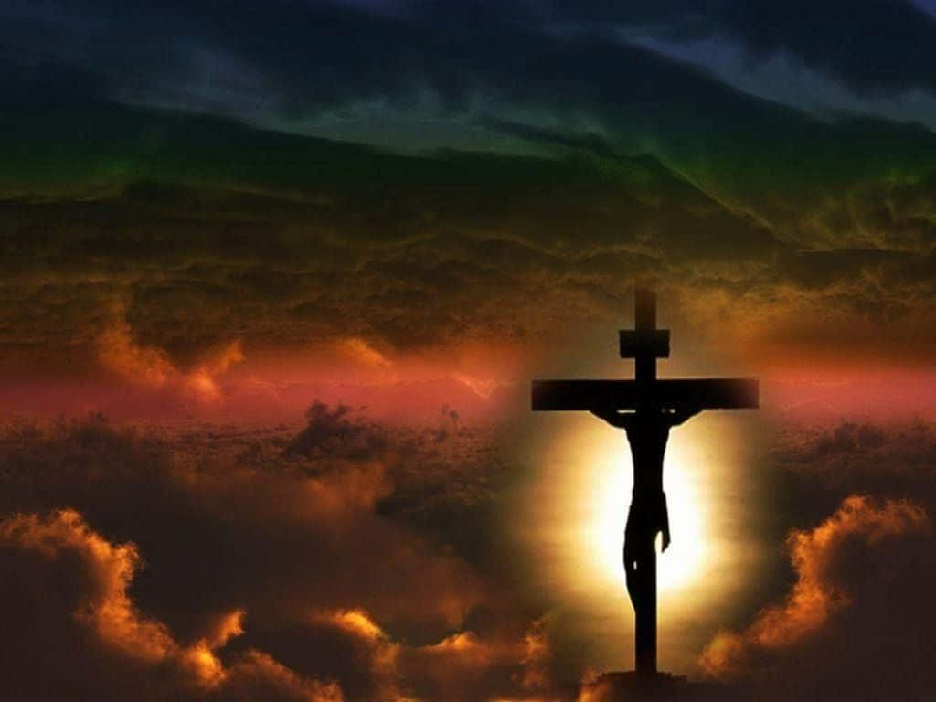 Immaginedi Gesù Sulla Croce Con Un Cielo Scuro Rosso