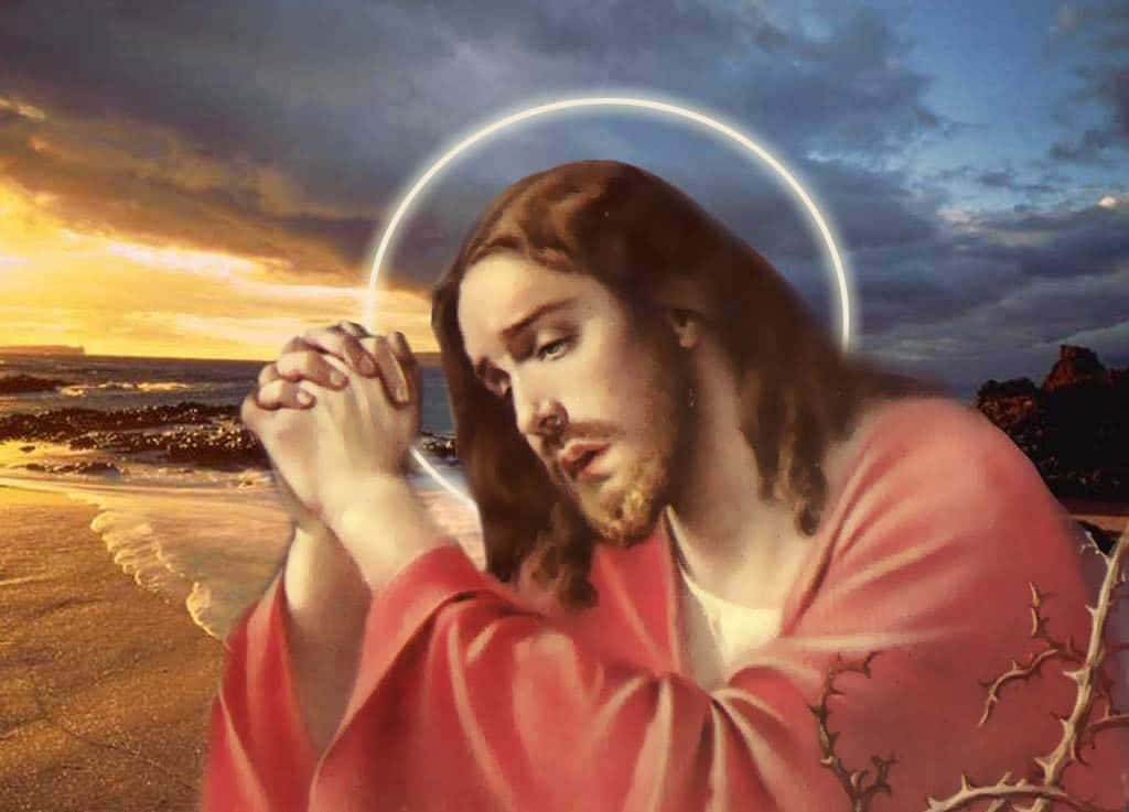 Jesus Kristus beder på strandbilledet Tapet