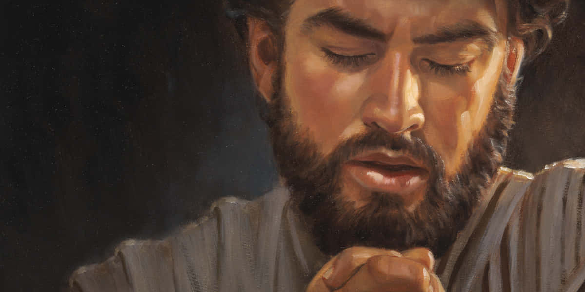 Jesus Christ Praying in Quiet Devotion Wallpaper