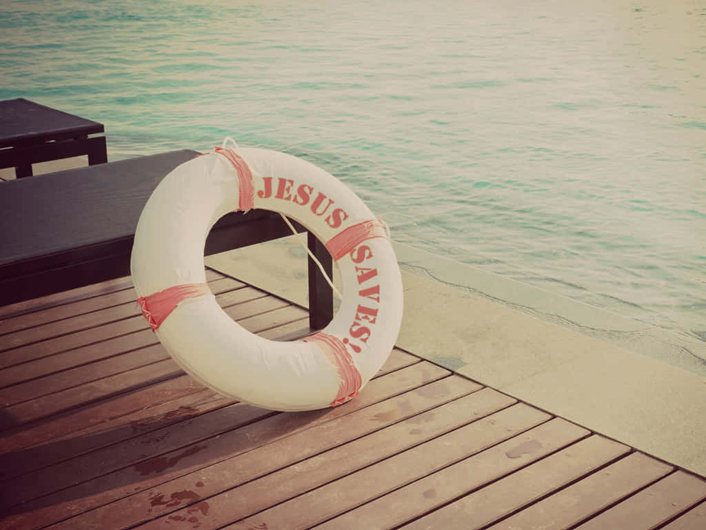 A Wooden Deck With A Life Preserver Wallpaper